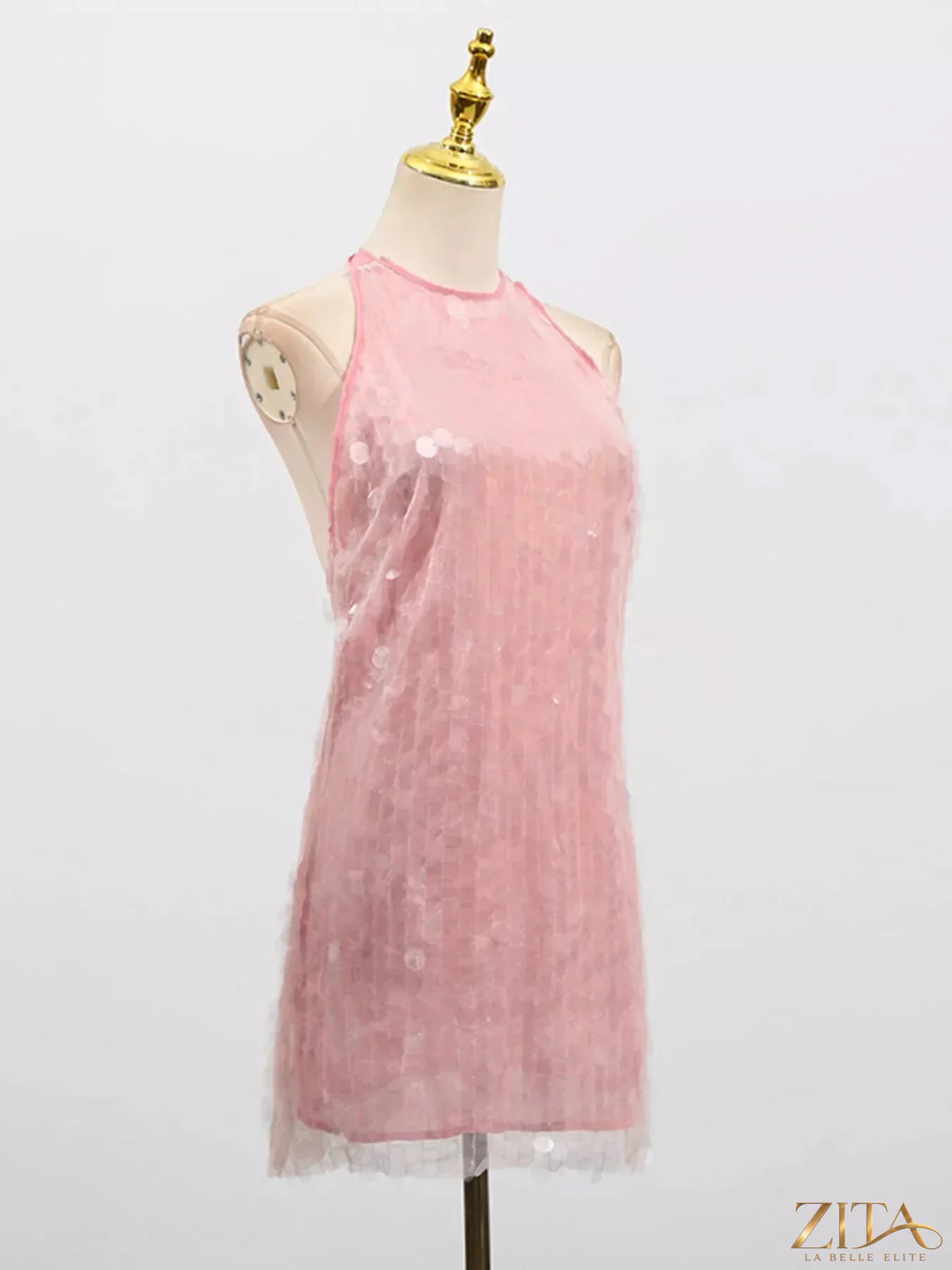 Sequin halter neck mini dress by Zita La Belle Elite featuring shimmering sequins and a stylish halter design for evening wear.