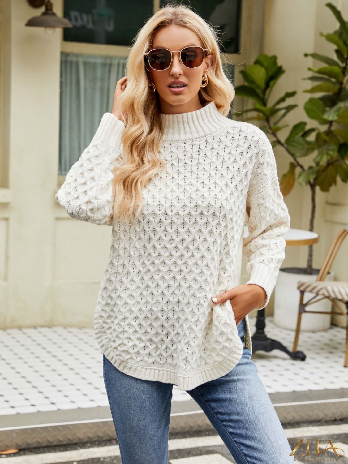 Zita La Belle Elite mock neck slit sweater in soft fabric, featuring a stylish slit detail at the hem.