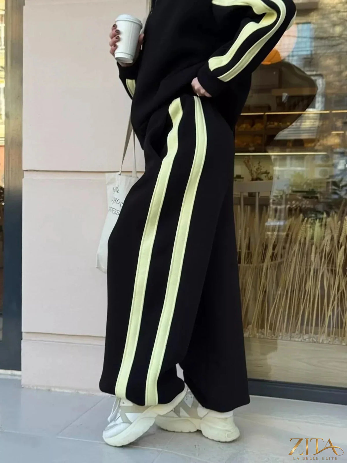 Zita La Belle Elite contrast striped zip-up top and pants set, featuring a stylish matching athleticwear ensemble.