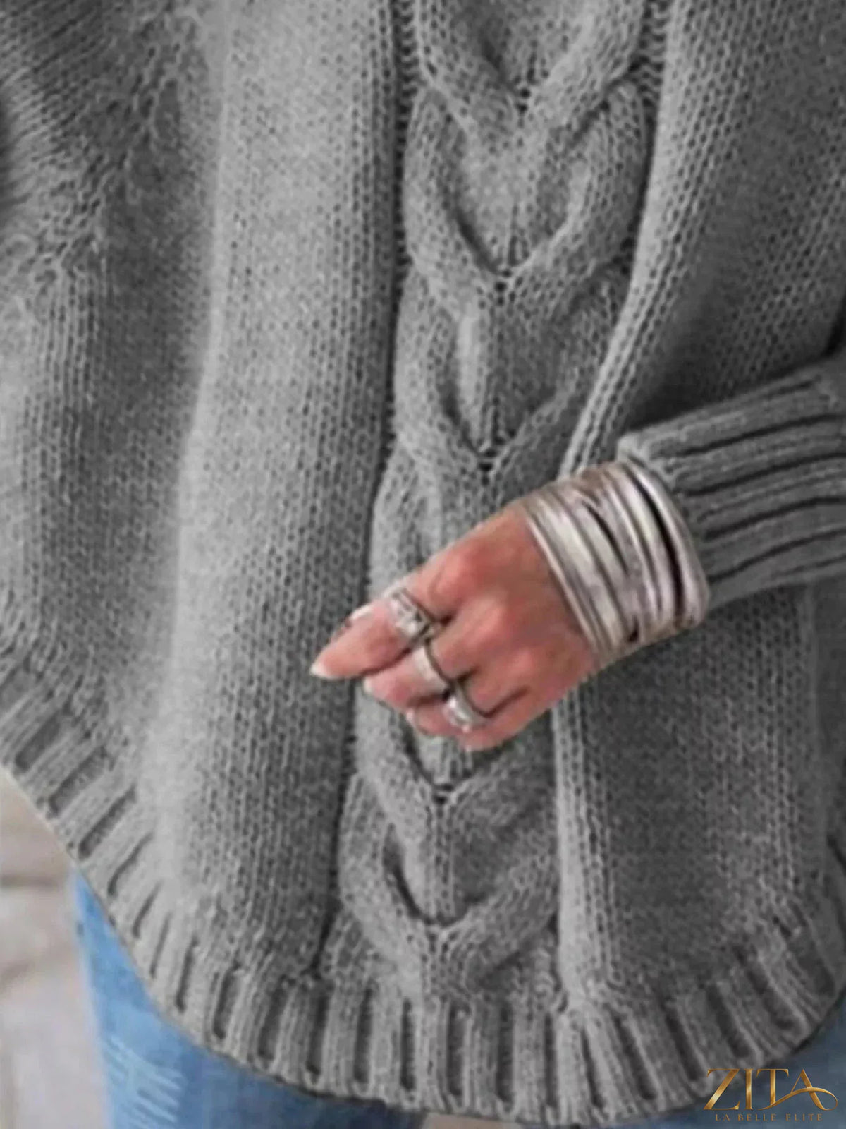 Zita La Belle Elite cable-knit long sleeve sweater in soft yarn, featuring a cozy, textured pattern and fitted ribbed cuffs.