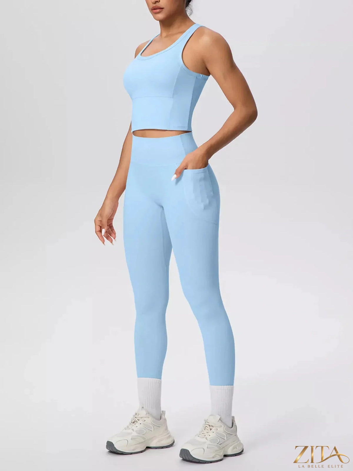 Zita La Belle Elite scoop neck tank top and high-waisted leggings active set in black, shown on a model for athletic wear.