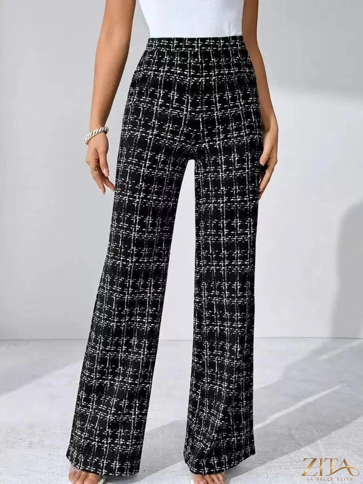 Zita La Belle Elite plaid wide-leg pants featuring a high waist and relaxed fit in a classic checkered pattern.