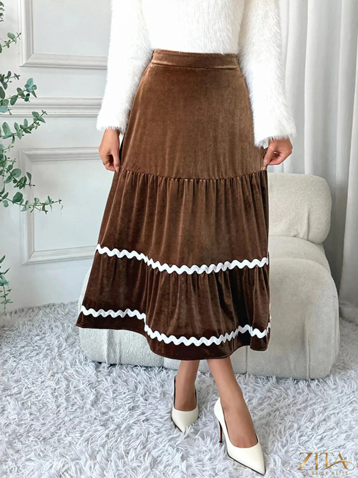 Velvet tiered midi skirt by Trendsi featuring a flowy, layered design in rich velvet fabric.