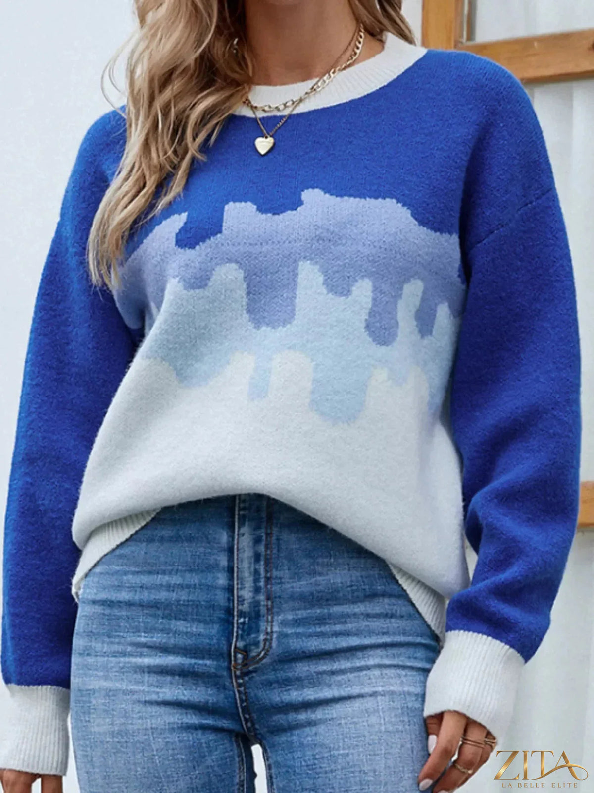 Contrast round neck sweater by Trendsi featuring a cozy knit design and a classic fit, shown in a front view.
