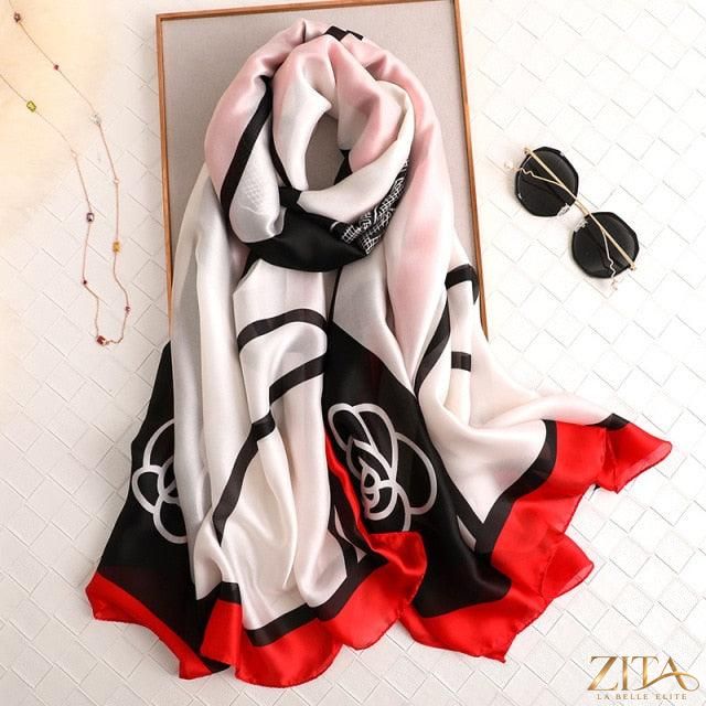 Luxury long printed silk scarf by Zita La Belle Elite, featuring intricate designs, perfect for stylish neck or head wraps.