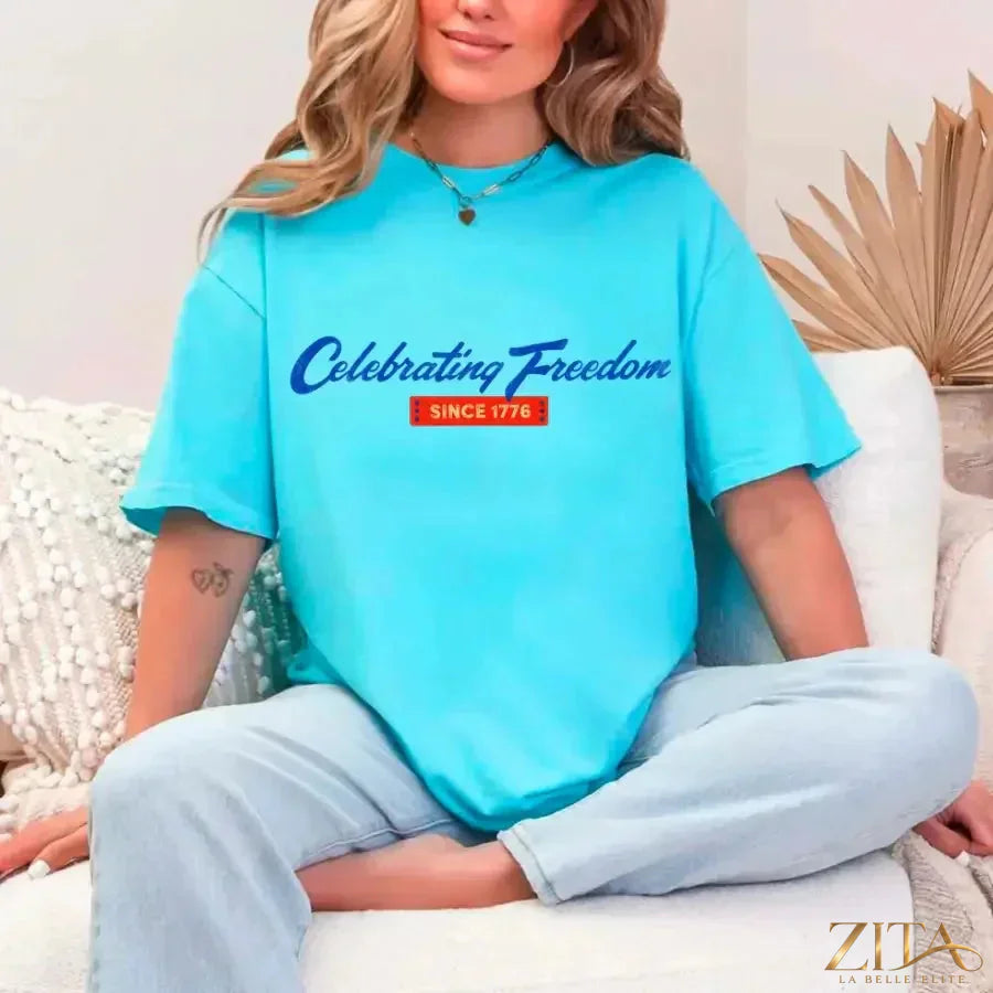 Turquoise patriotic T-shirt by Zita La Belle Elite with "Celebrating Freedom Since 1776" for 4th of July celebrations.