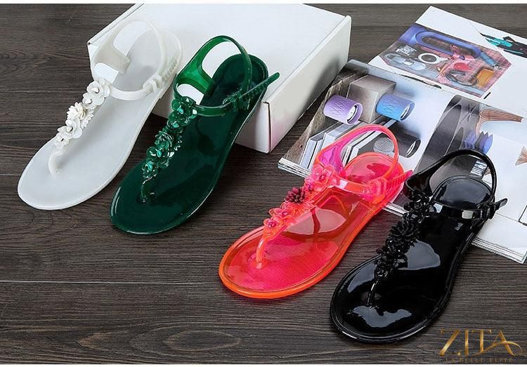 Women’s Zita La Belle Elite flower T-strap flat thong sandals with breathable design and non-slip soles, perfect for summer beachwear.