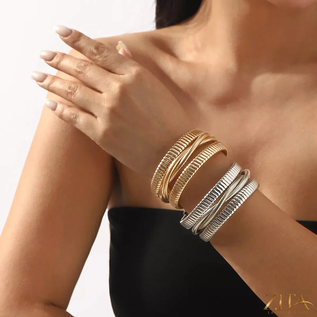 Multi-layered open bracelet by Zita La Belle Elite featuring delicate metal strands and modern design.