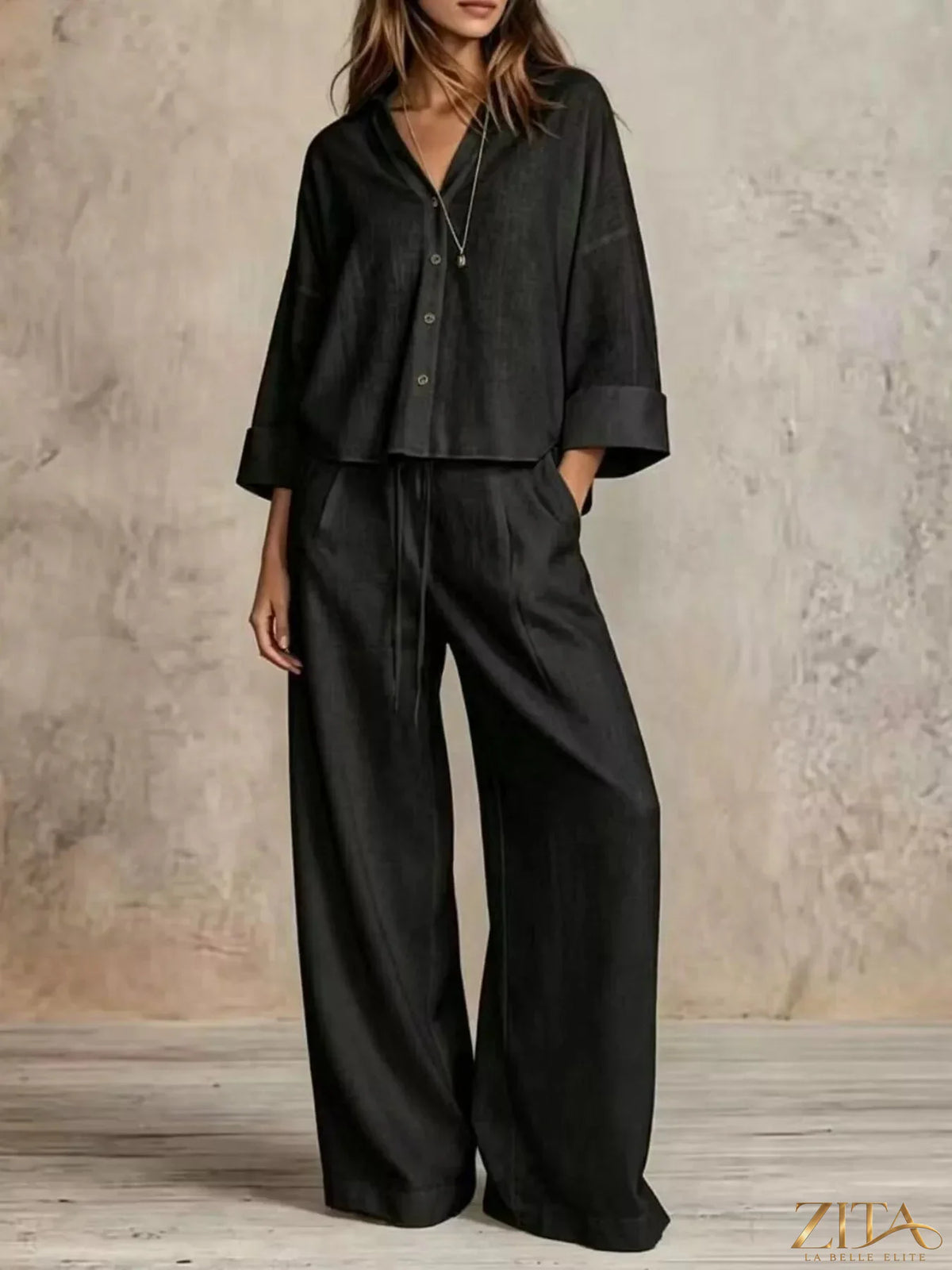 Plus size Zita La Belle Elite button-down shirt and wide-leg pants set, featuring a stylish, comfortable ensemble in natural fabric.