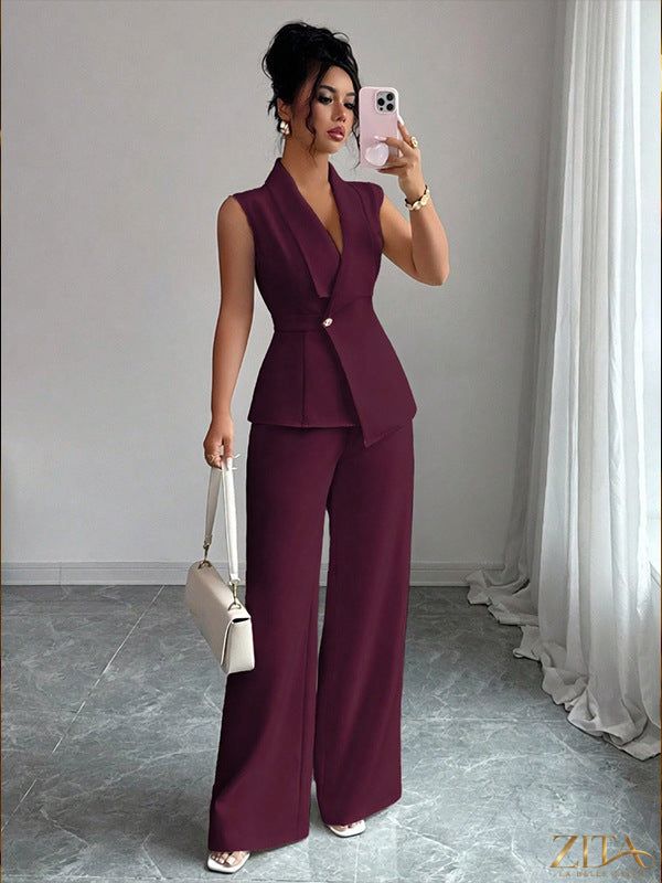 Women's peplum sleeveless blazer and wide-leg pants two-piece set by Zita La Belle Elite, shown in a stylish, coordinated outfit.