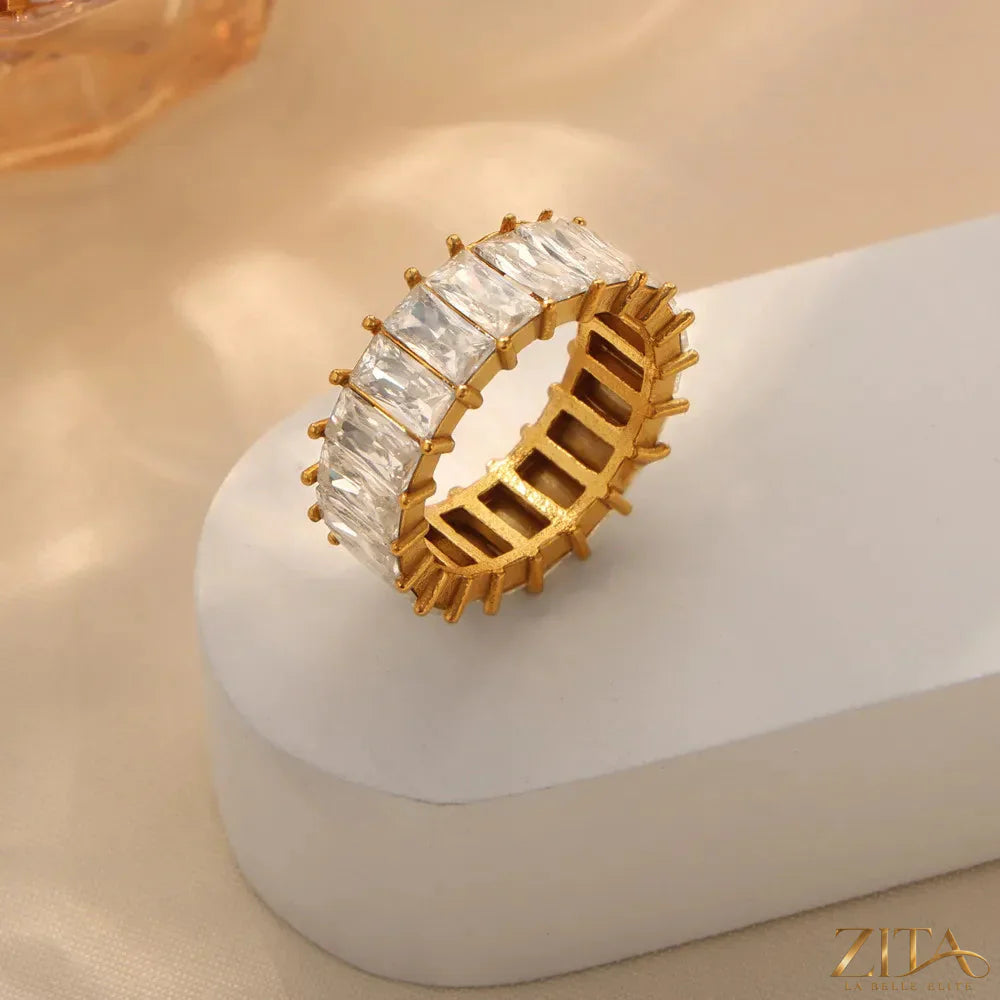 Titanium steel ring with inlaid zircon gemstones, elegant jewelry piece by Zita La Belle Elite, showcasing a sleek, modern design.