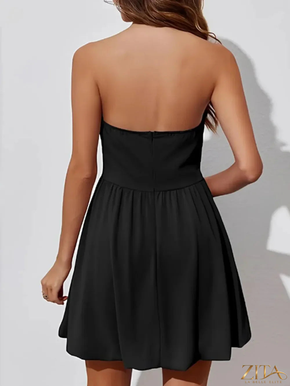 Zita La Belle Elite ruched tube mini dress in black, fitted sleeveless style with gathered fabric and a sleek, modern design.