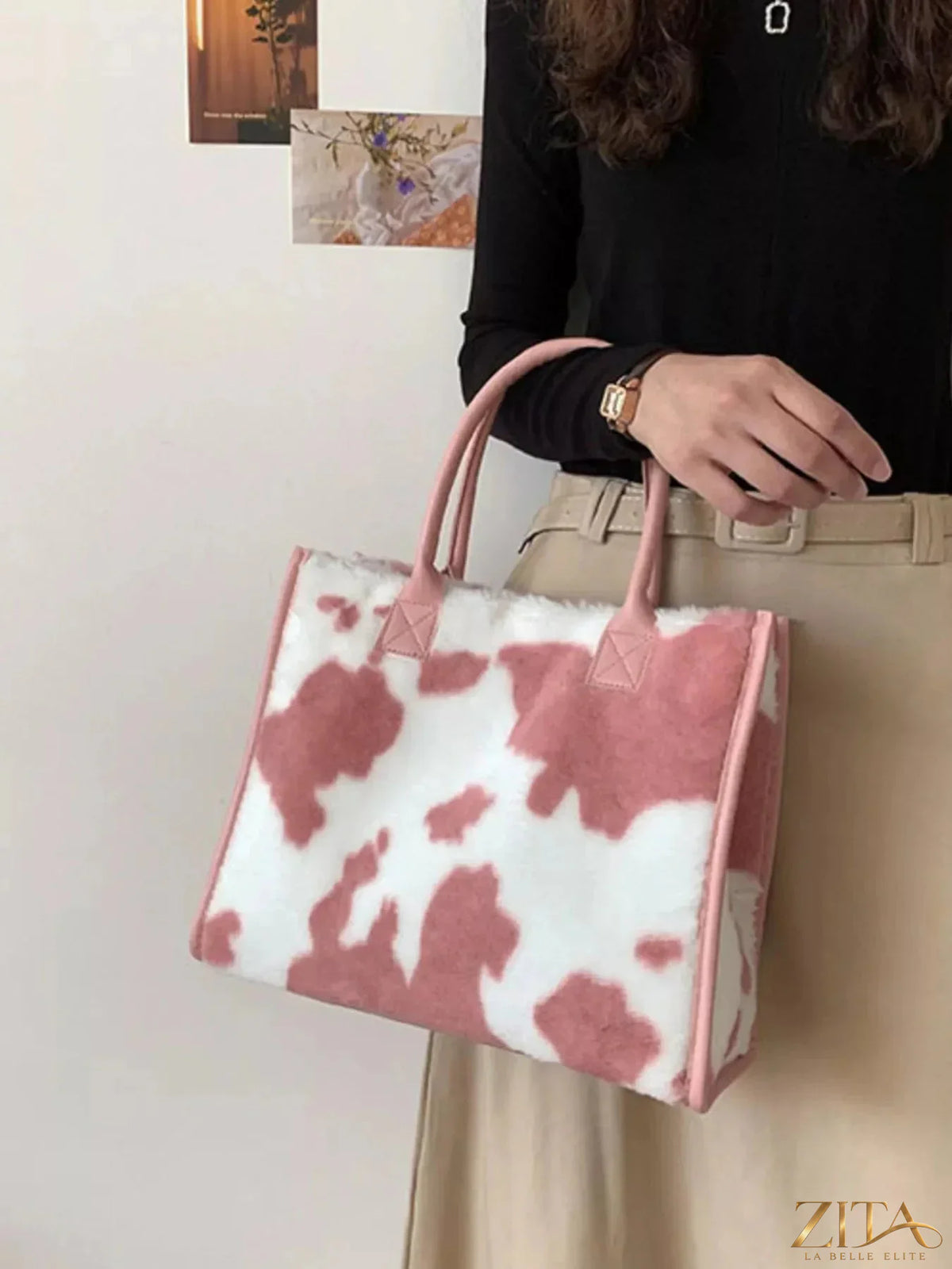 Zita La Belle Elite plush tote bag in soft pastel pink with rounded handles and a cozy, textured surface.