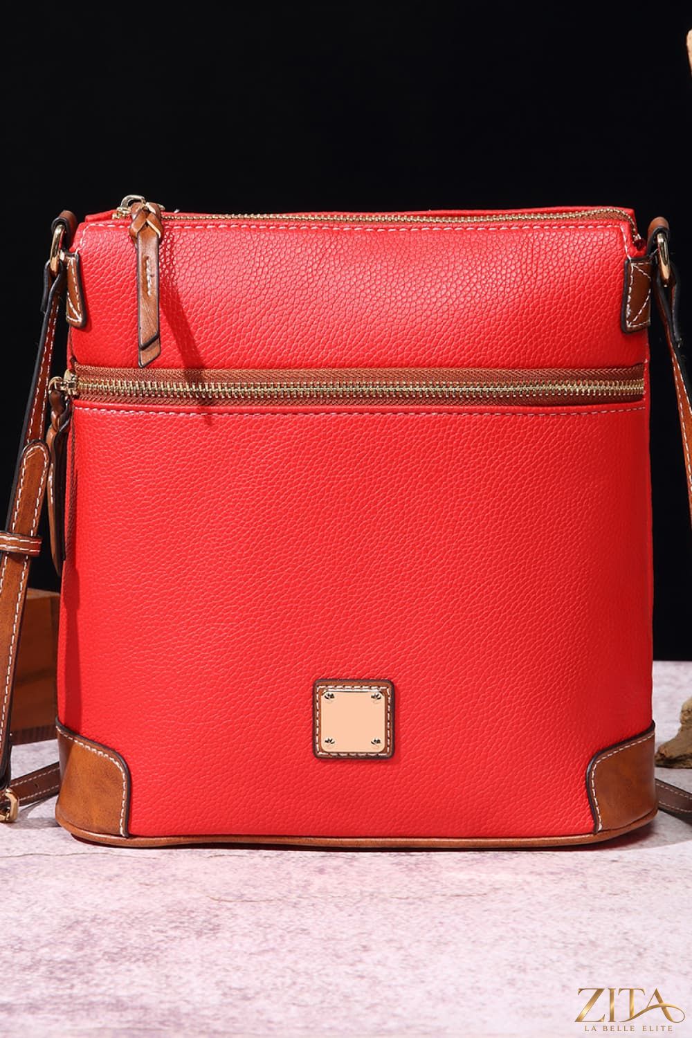 Zita La Belle Elite PU leather crossbody bag with adjustable strap and sleek design, shown in black.