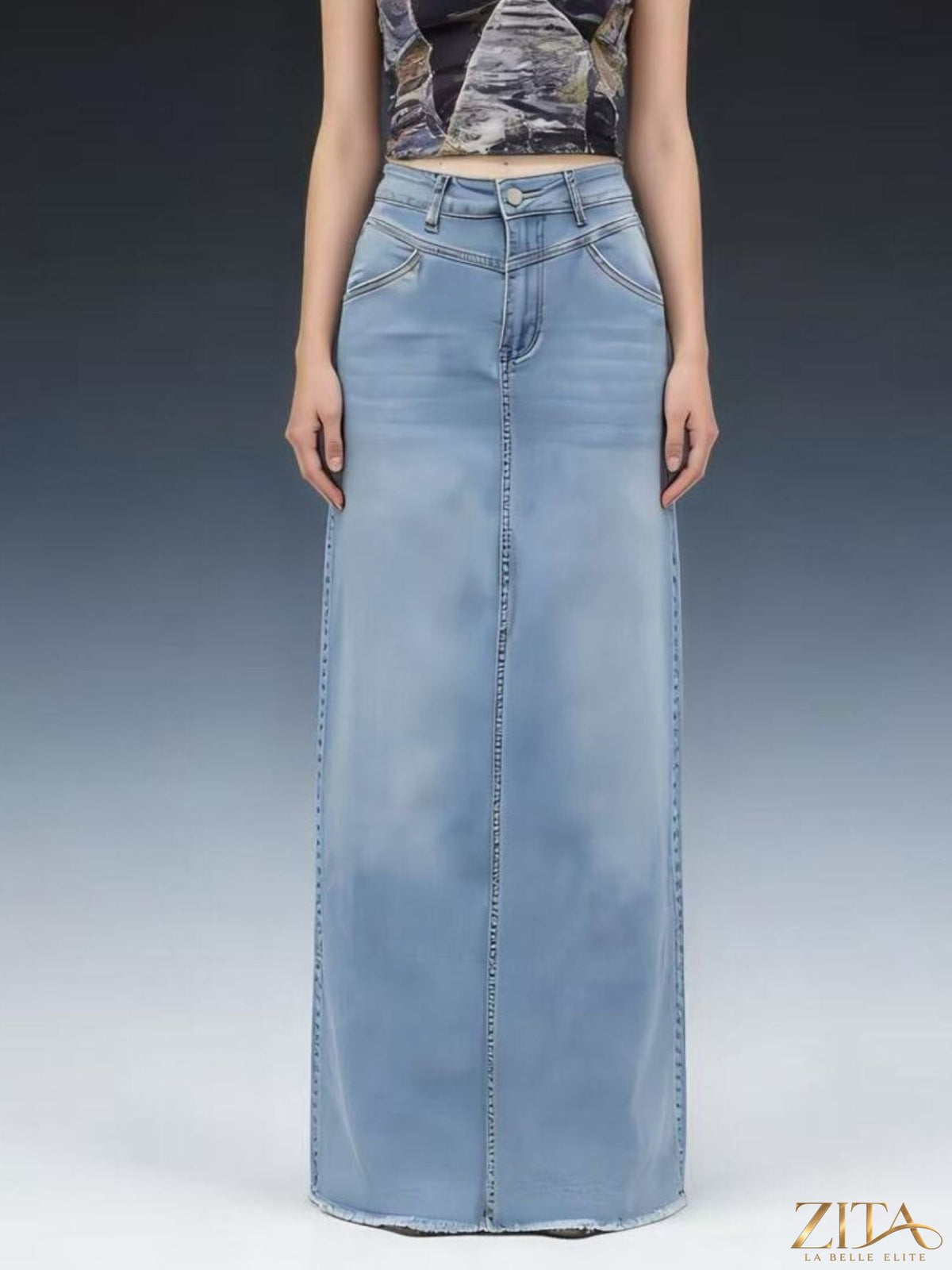 Raw hem maxi denim skirt by Zita La Belle Elite, showcasing a flowy denim design with a raw hem detail.