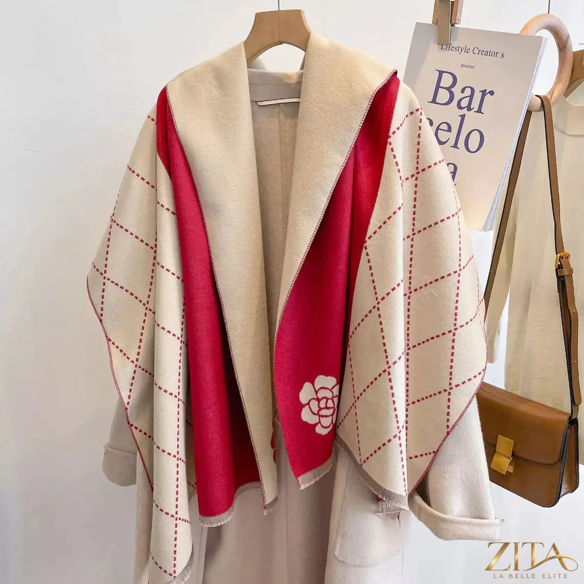 Raw hem scarf by Trendsi featuring soft fabric and fringed edges, styled loosely for a casual, boho look.