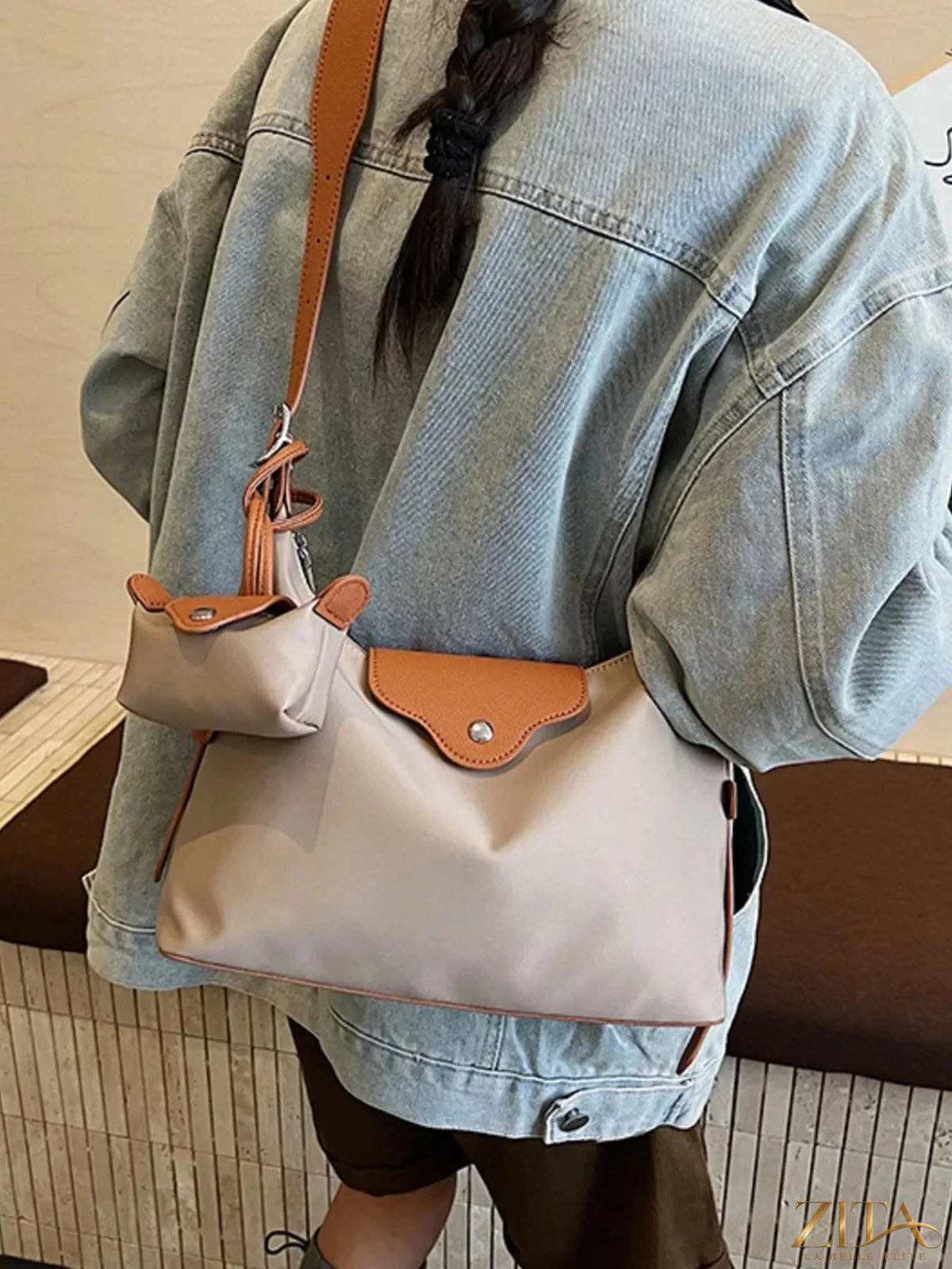 Zita La Belle Elite hobo crossbody bag with matching coin purse, black leather, adjustable strap, and stylish design.