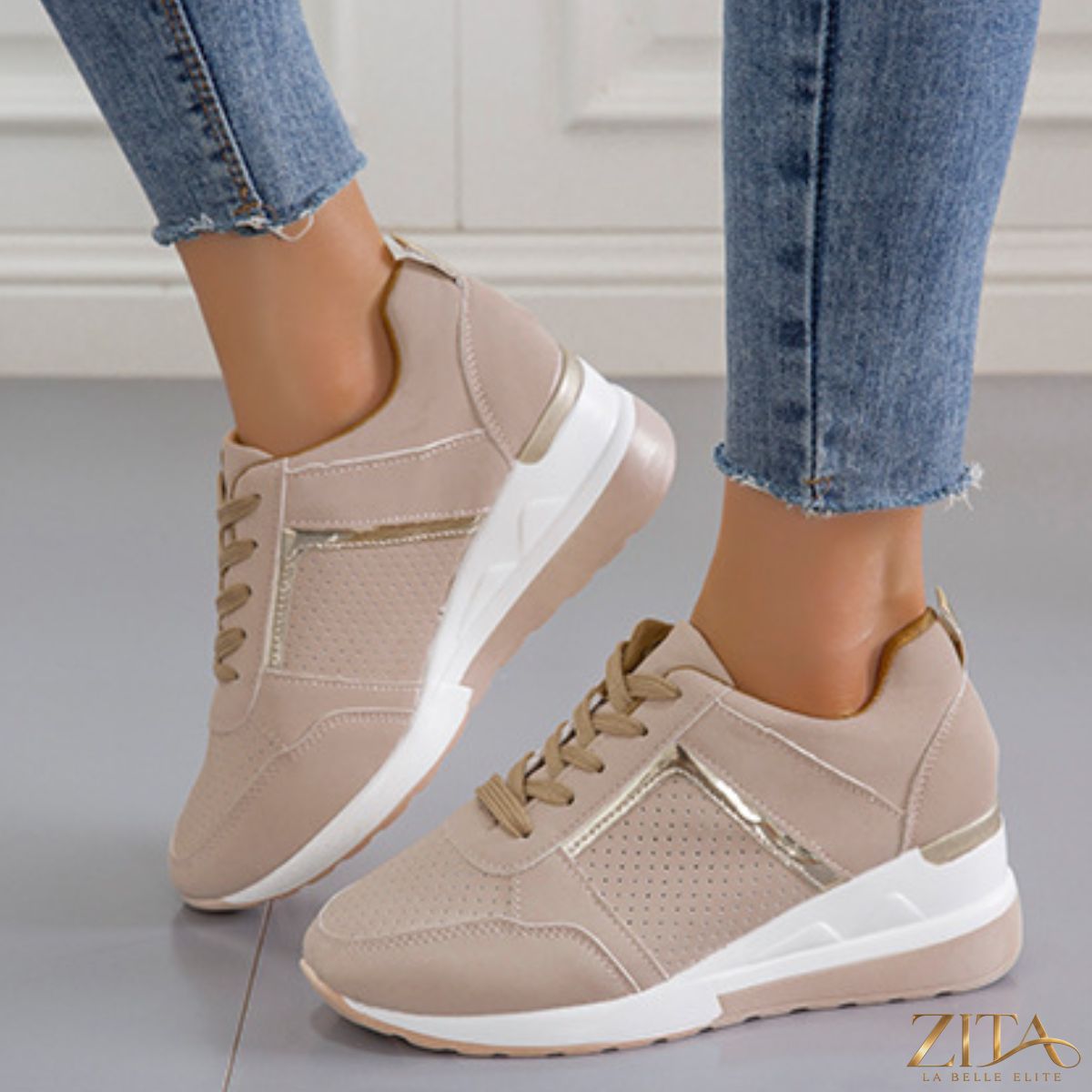 Zita La Belle Elite lace-up wedge sneakers with white and beige design, featuring a chunky platform sole and stylish accents.
