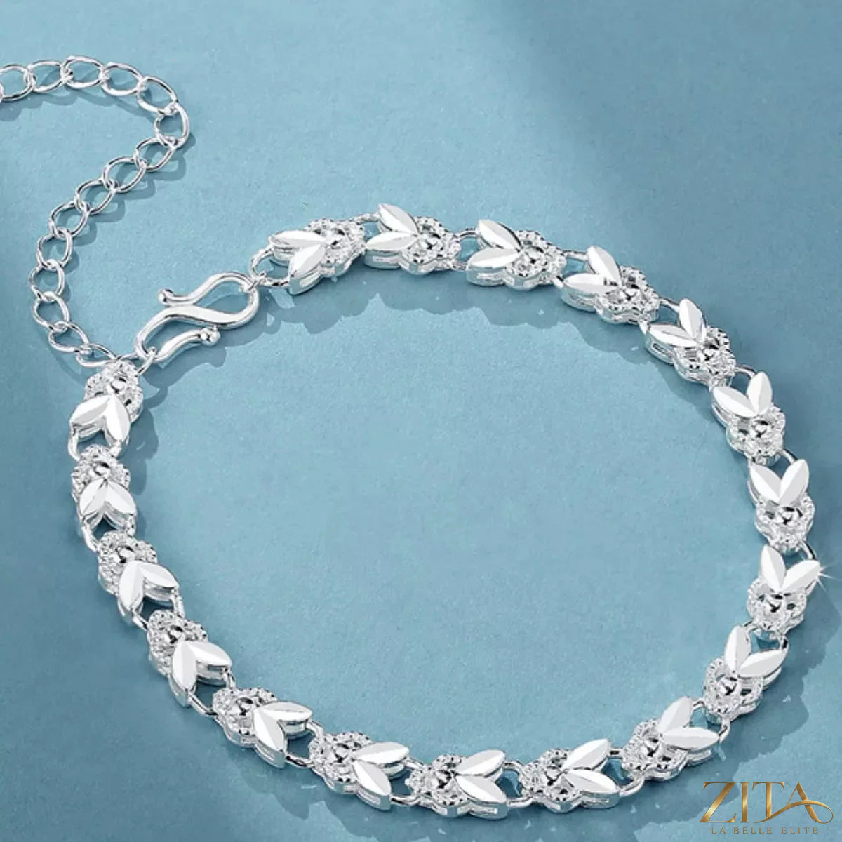 Sterling silver chain bracelet with a sleek, minimalist design, featuring a shiny, polished finish, perfect for everyday wear.