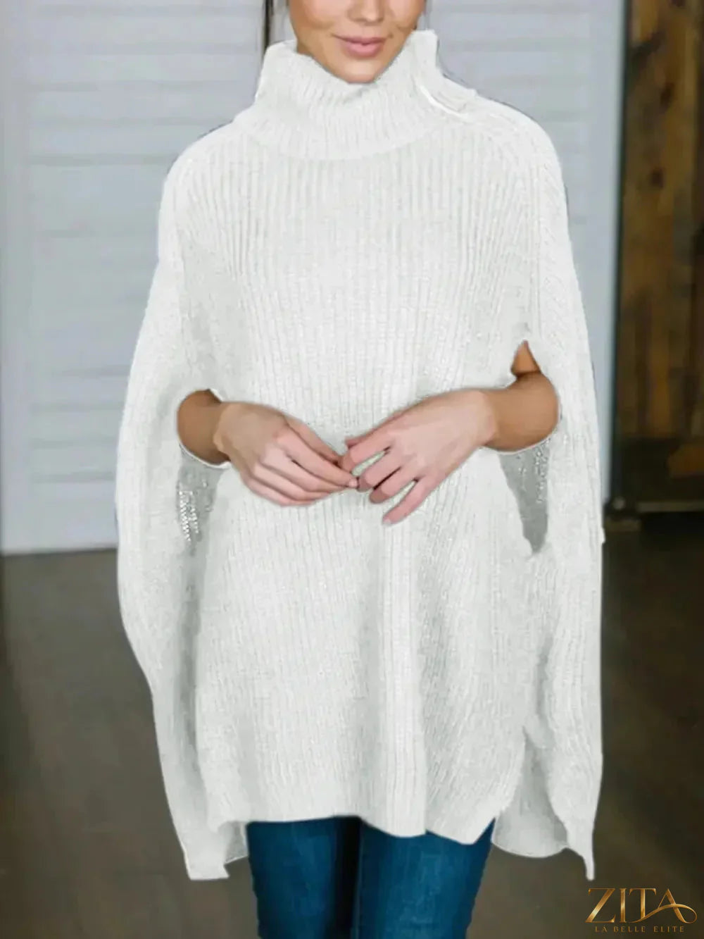 Zita La Belle Elite turtleneck slit sweater in cozy knit, featuring a high neckline and stylish side slit detail.