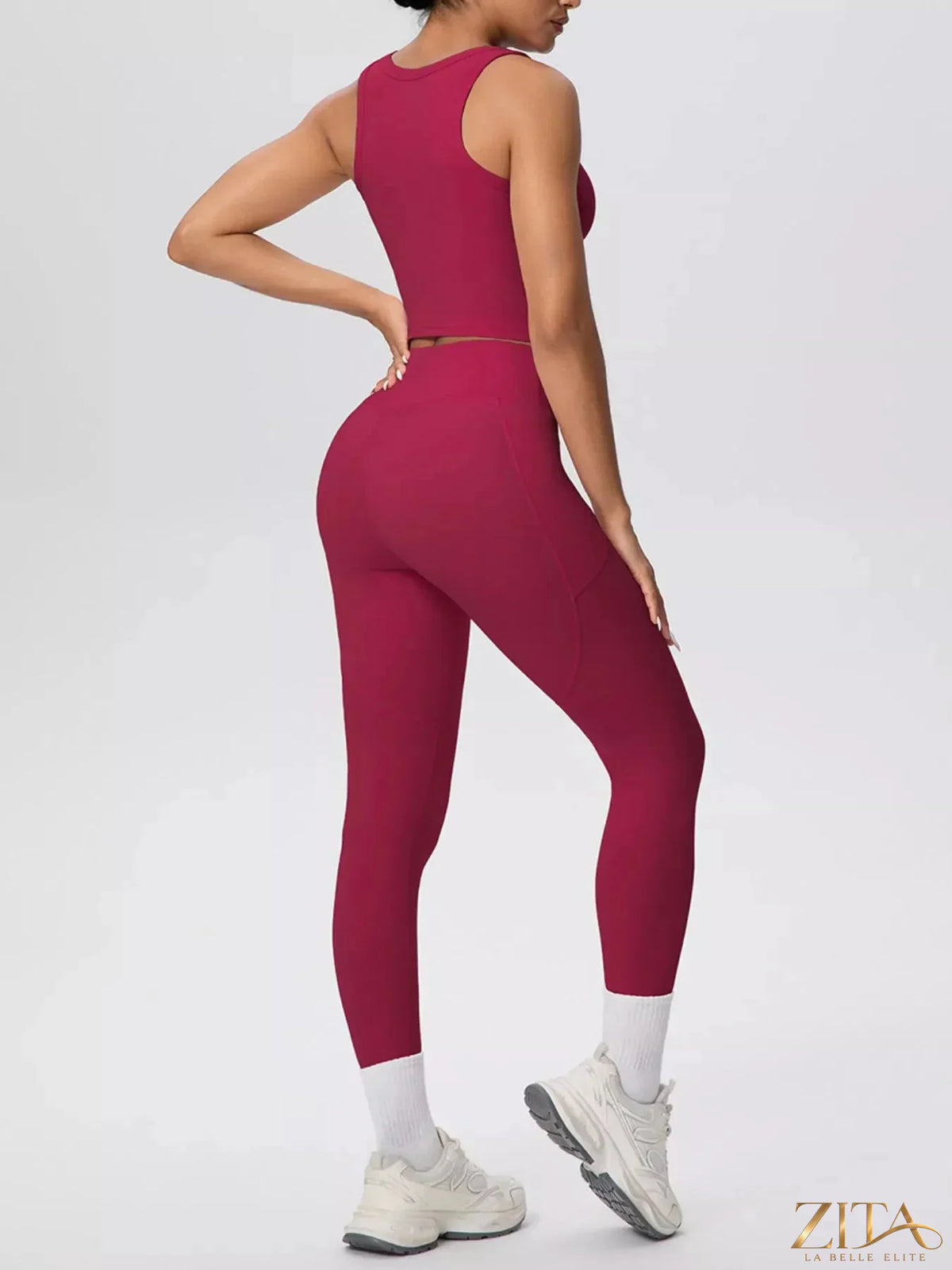 Zita La Belle Elite scoop neck tank top and high-waisted leggings active set, black stretch fabric, laid flat for display.