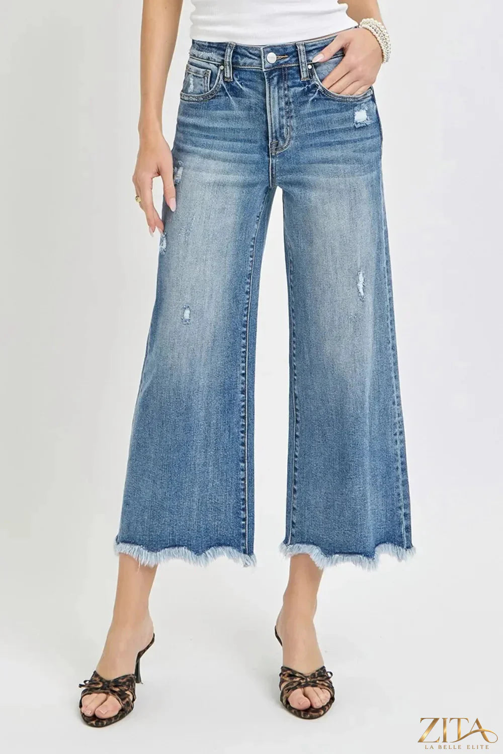 Zita La Belle Elite Risen high rise cropped flare jeans, denim with a fitted waist and flared legs, shown on a model.
