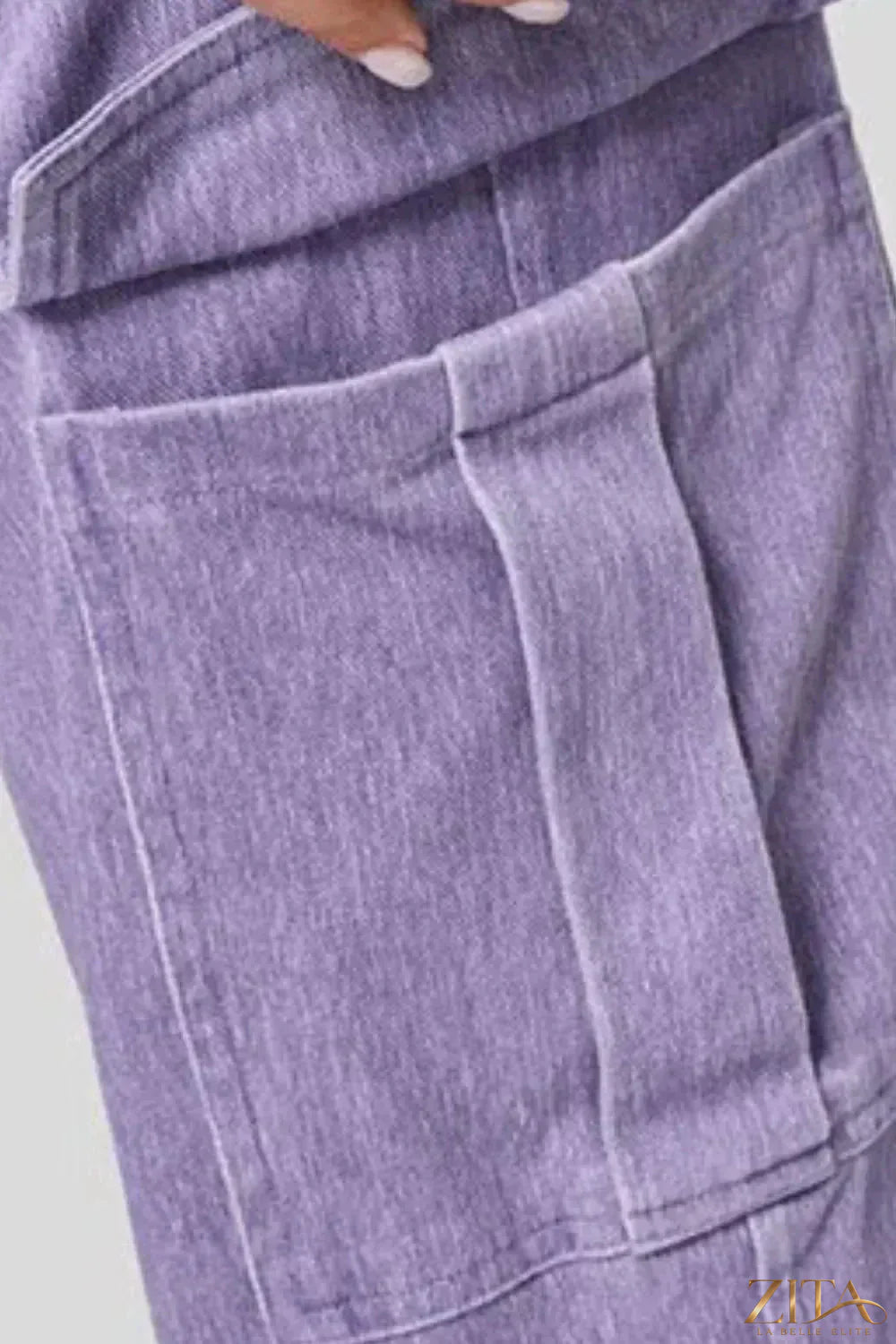 High waist straight leg cargo jeans by Zita La Belle Elite displayed on a model, featuring functional pockets and a classic denim look.