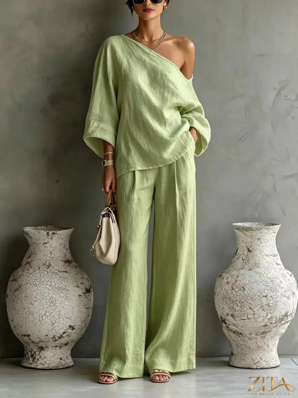 Zita La Belle Elite one shoulder top and wide-leg pants set, featuring a stylish, coordinated fashion look.