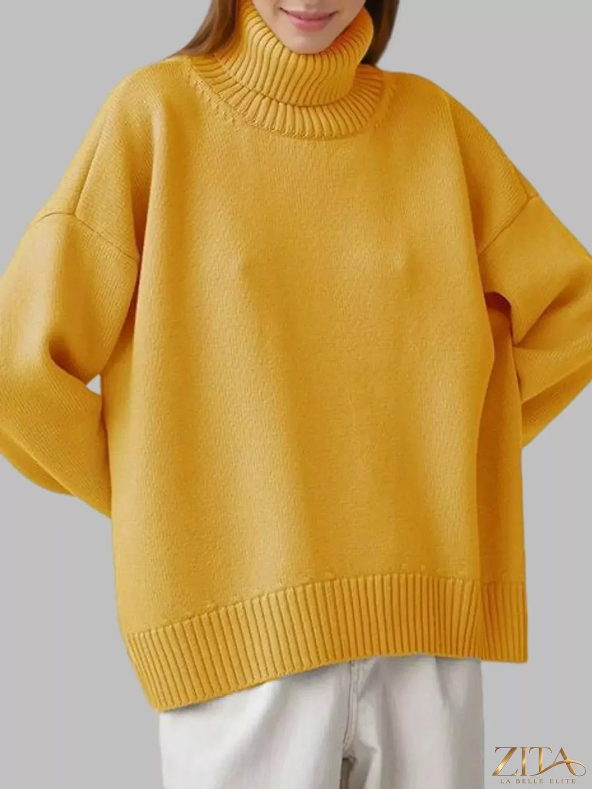 Zita La Belle Elite turtleneck dropped shoulder sweater in soft knit, shown in a cozy, relaxed fit with ribbed collar and cuffs.