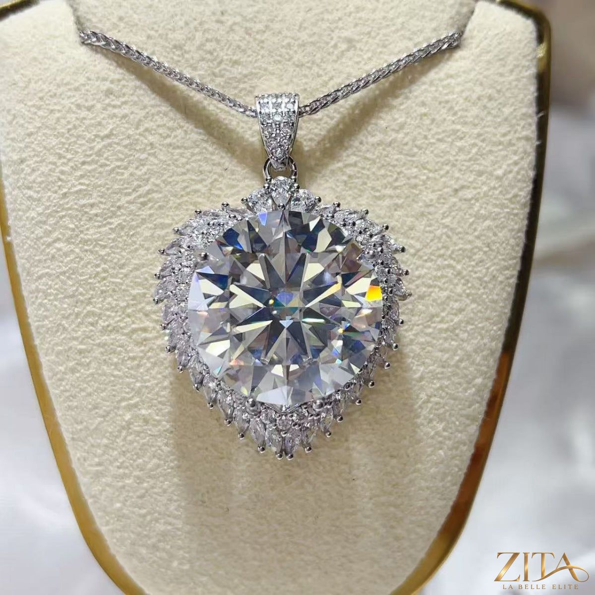 Sterling silver pendant necklace with a 20-carat moissanite gemstone, featuring a sleek and elegant jewelry design.