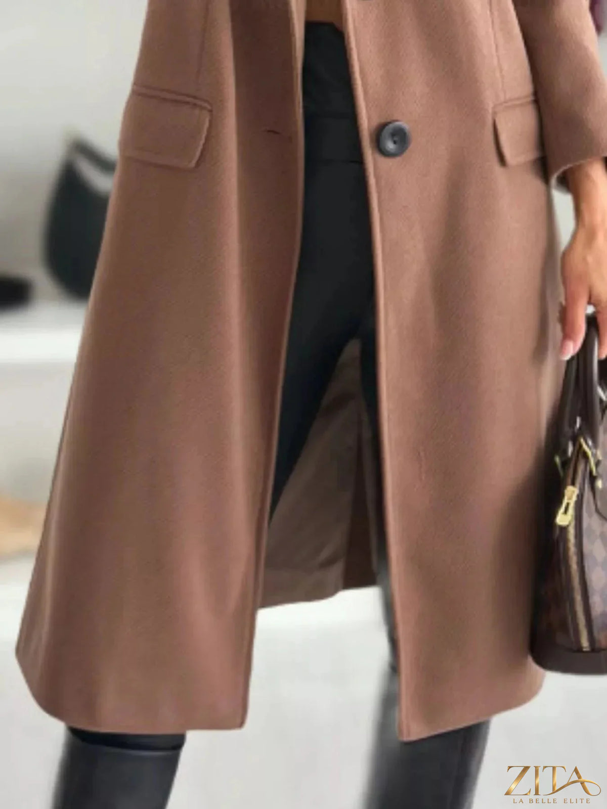 Zita La Belle Elite lapel collar long sleeve coat displayed on a hanger, featuring a tailored fit and classic design.