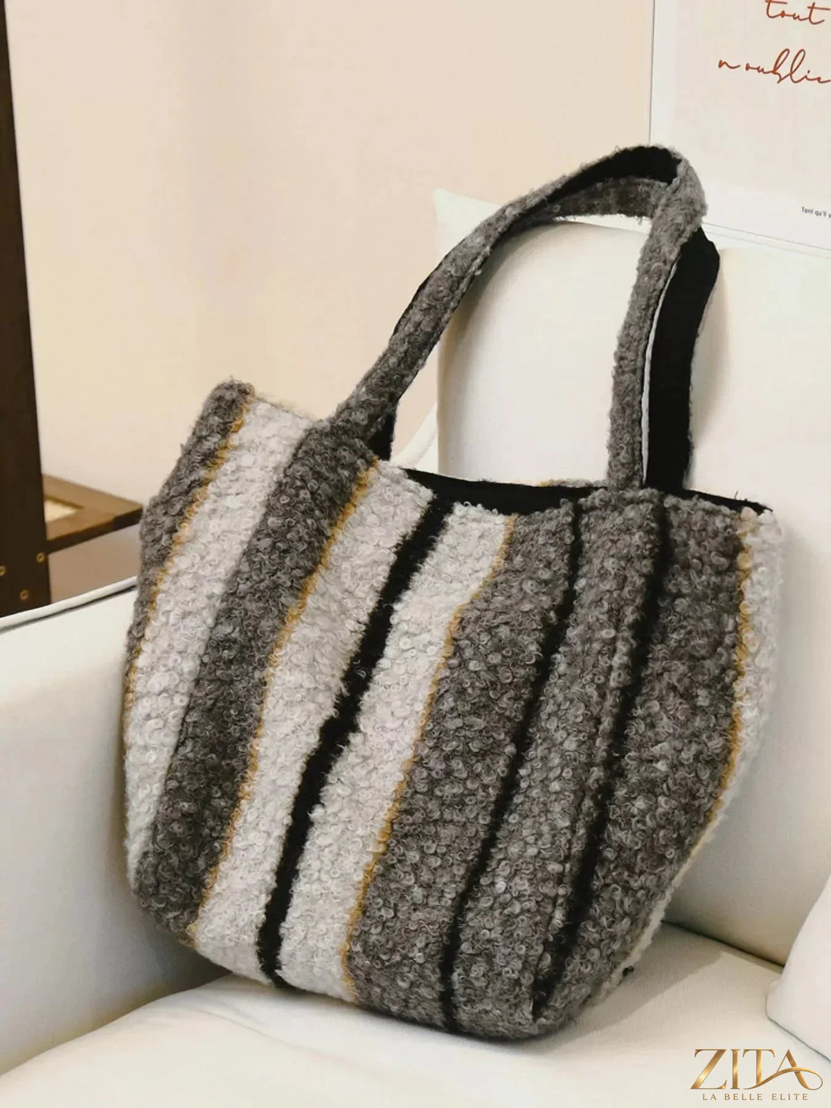 Reversible striped plush tote bag by Zita La Belle Elite, showing both patterned sides and sturdy handles on a plain background.