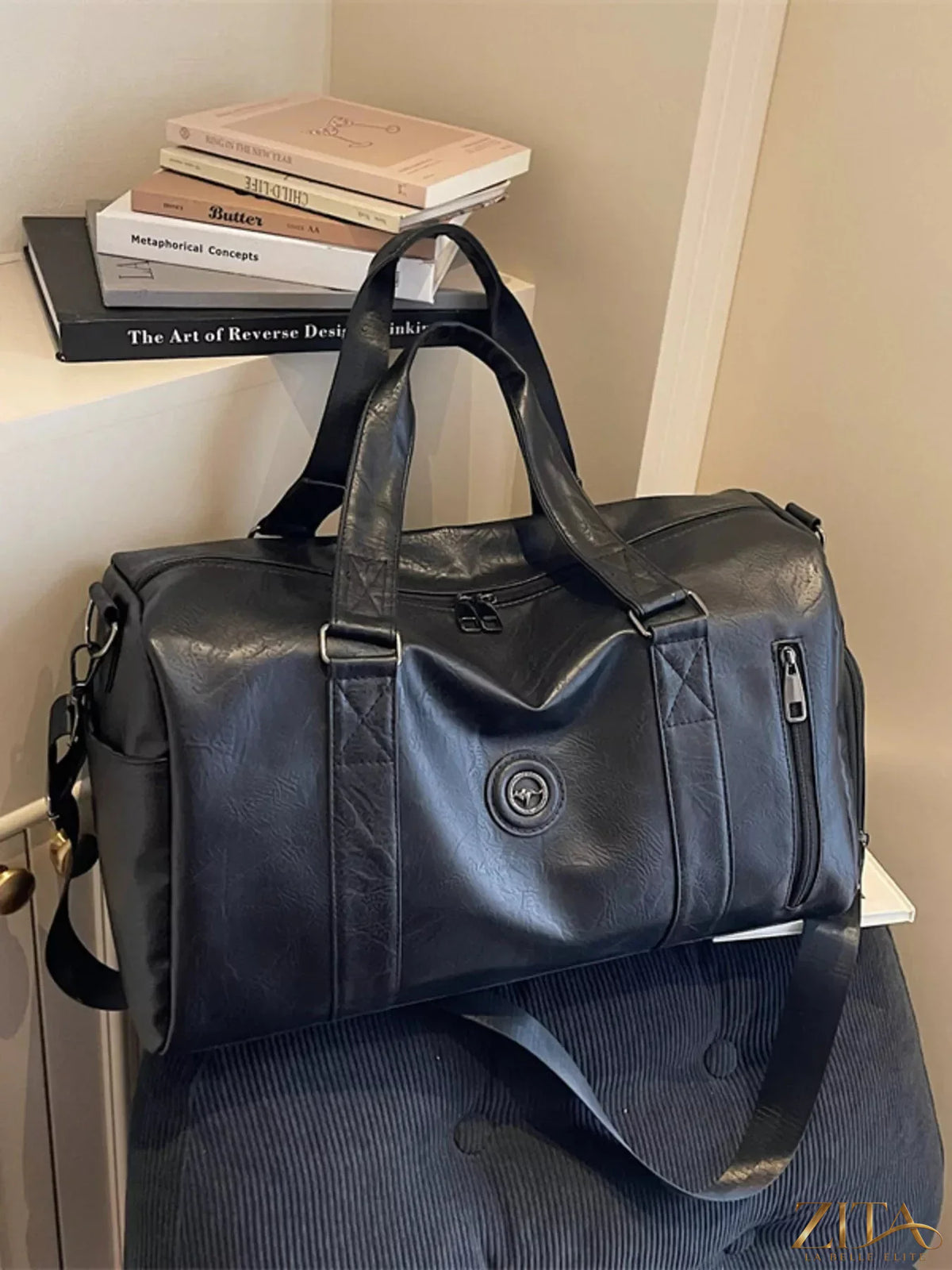 Trendsi PU leather duffel bag with sturdy handles and spacious main compartment, ideal for travel or gym use.