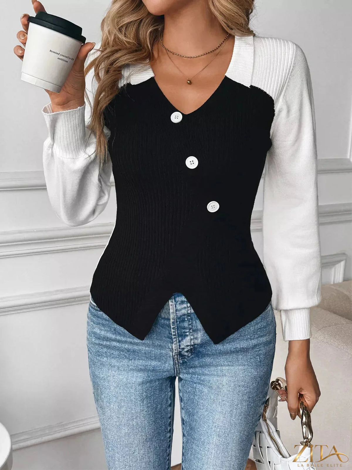 Color block V-neck sweater by Zita La Belle Elite featuring bold color sections and a classic fit, shown in the image.