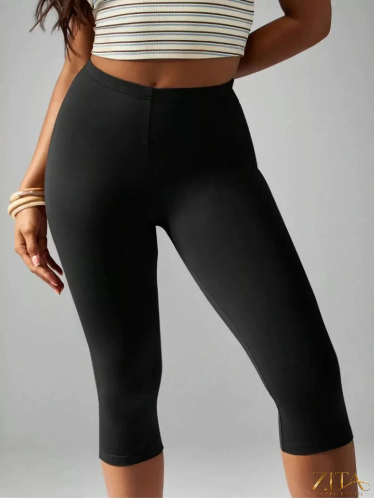 High-waisted Zita La Belle Elite active capri leggings shown on a model, featuring a sleek fit and stretchy fabric for workout comfort.