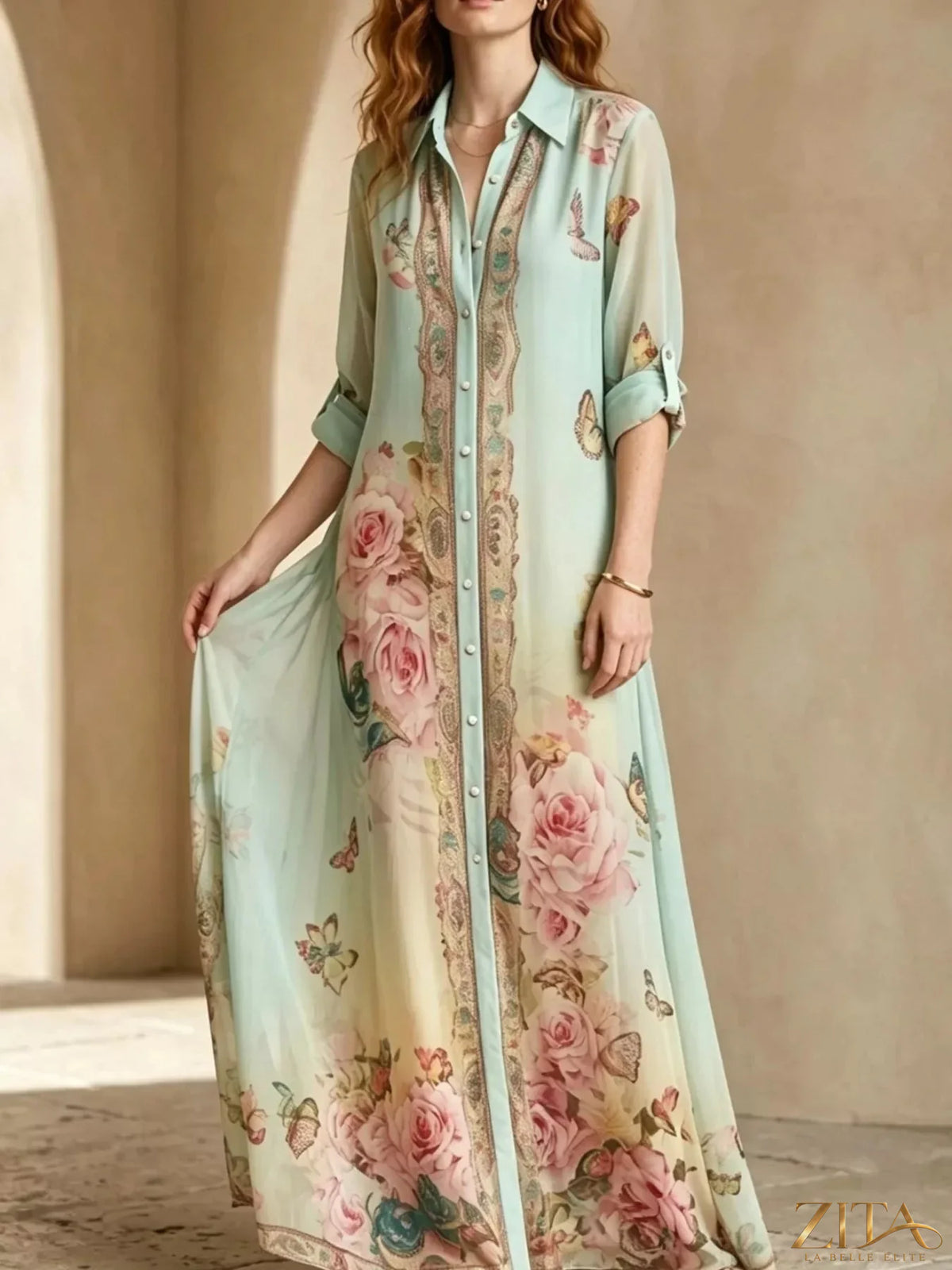 Plus size floral print button-down maxi shirt dress by Zita La Belle Elite, showing a full-length dress with vibrant floral patterns.