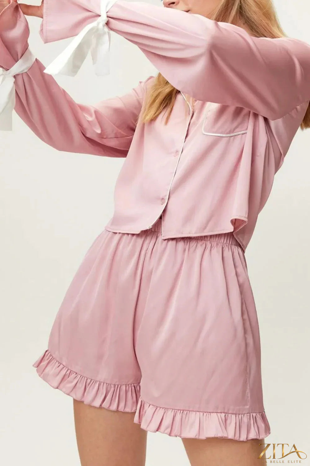 Zita La Belle Elite Basic Bae tied cuff collared neck top and frill shorts lounge set, shown on a model with a casual indoor setting.