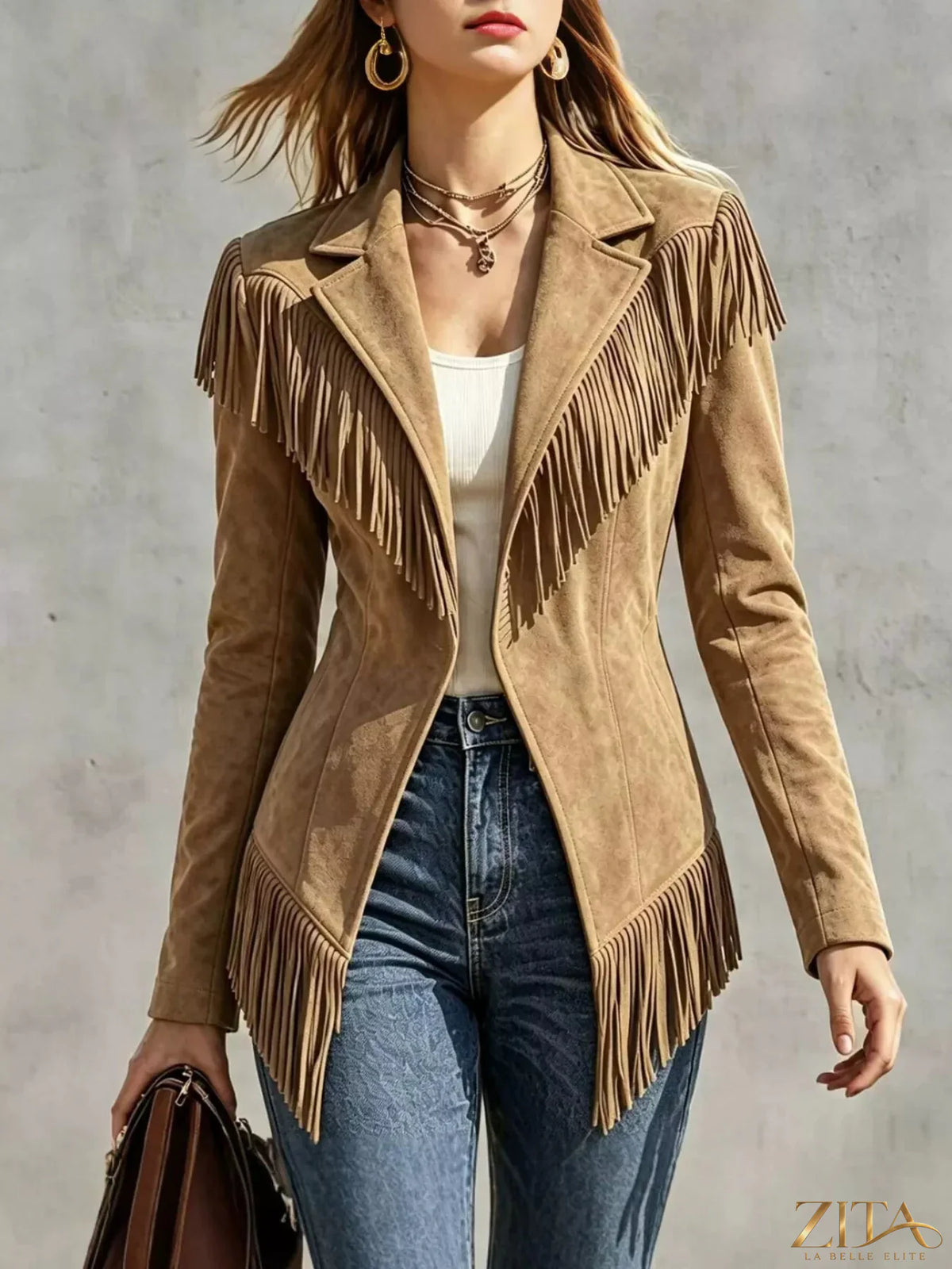 Western-inspired fringed open front jacket from Trendsi with fringe details and lightweight fabric.
