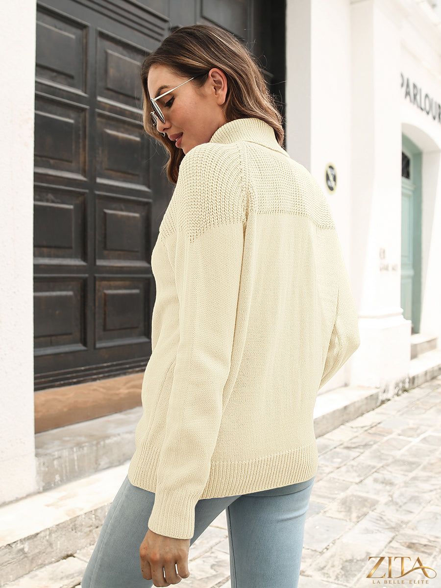 Black turtleneck raglan sleeve sweater from Trendsi, showcasing a cozy knit with contrasting sleeve and body colors.