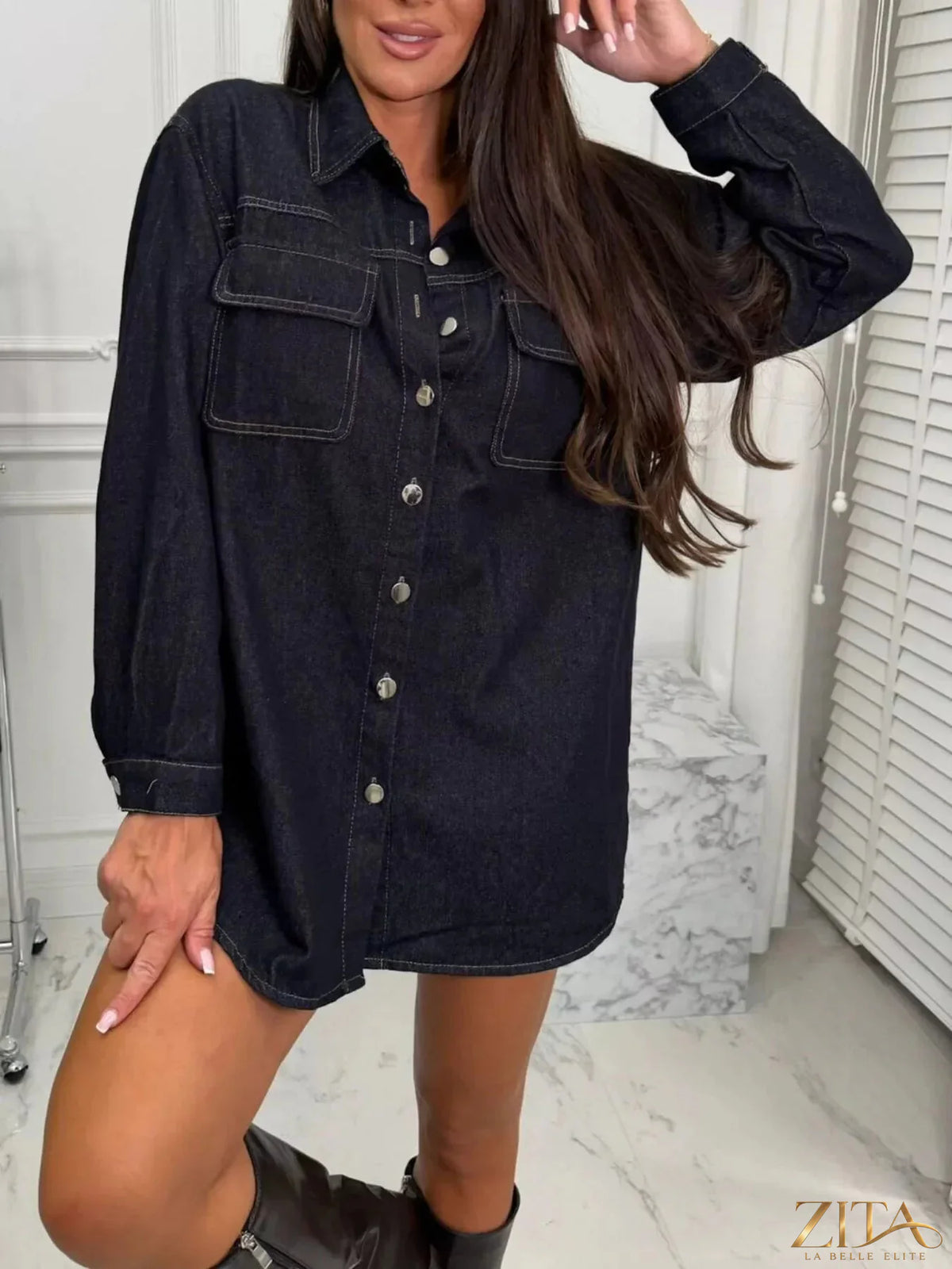 Vintage washed denim jacket by Zita La Belle Elite featuring chest pockets and classic style, shown on a model.