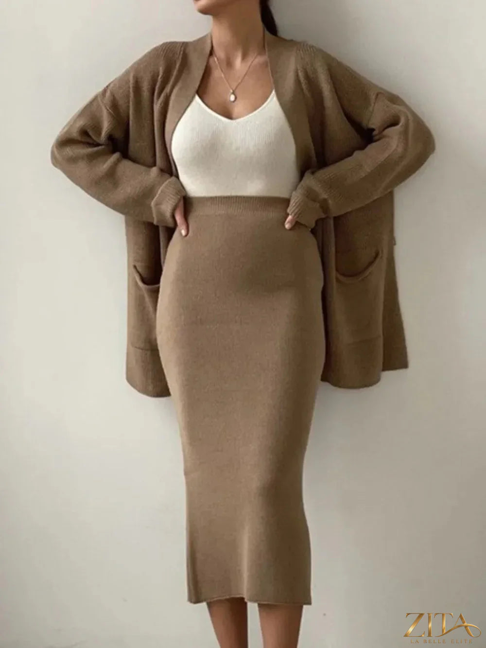 Zita La Belle Elite pocketed long sleeve cardigan and skirt sweater set, soft knit fabric, stylish and comfortable for casual wear.