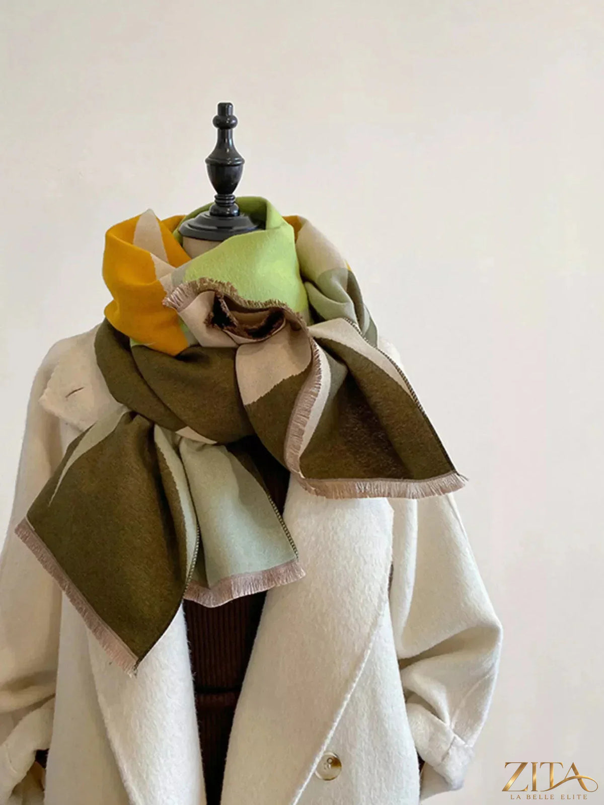 Contrast raw hem scarf by Trendsi featuring soft fabric and stylish raw edge detailing, perfect for layered fashion accessories.