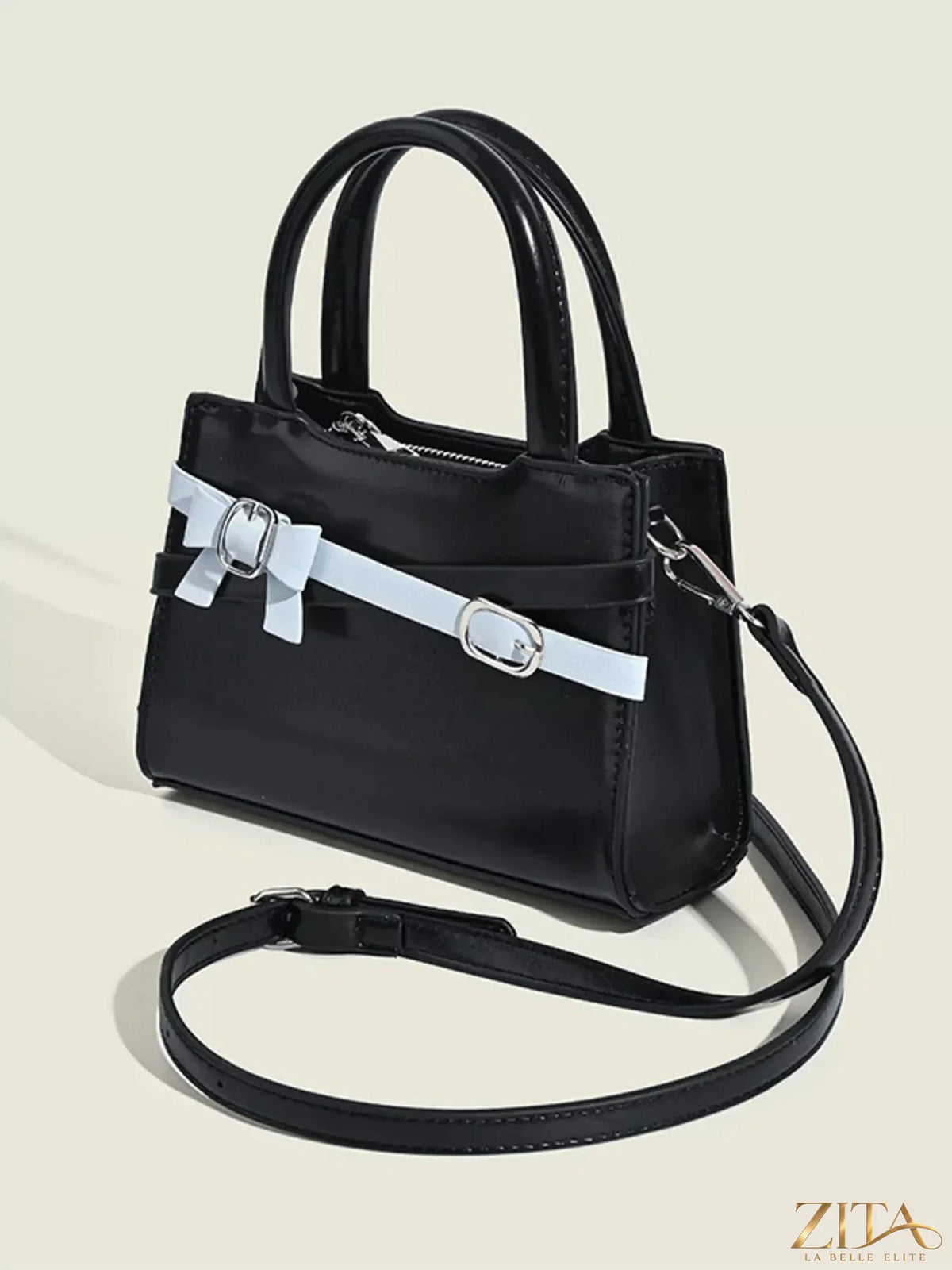 Zita La Belle Elite bow decor top handle handbag with elegant design and structured shape, featuring a stylish bow on the front.