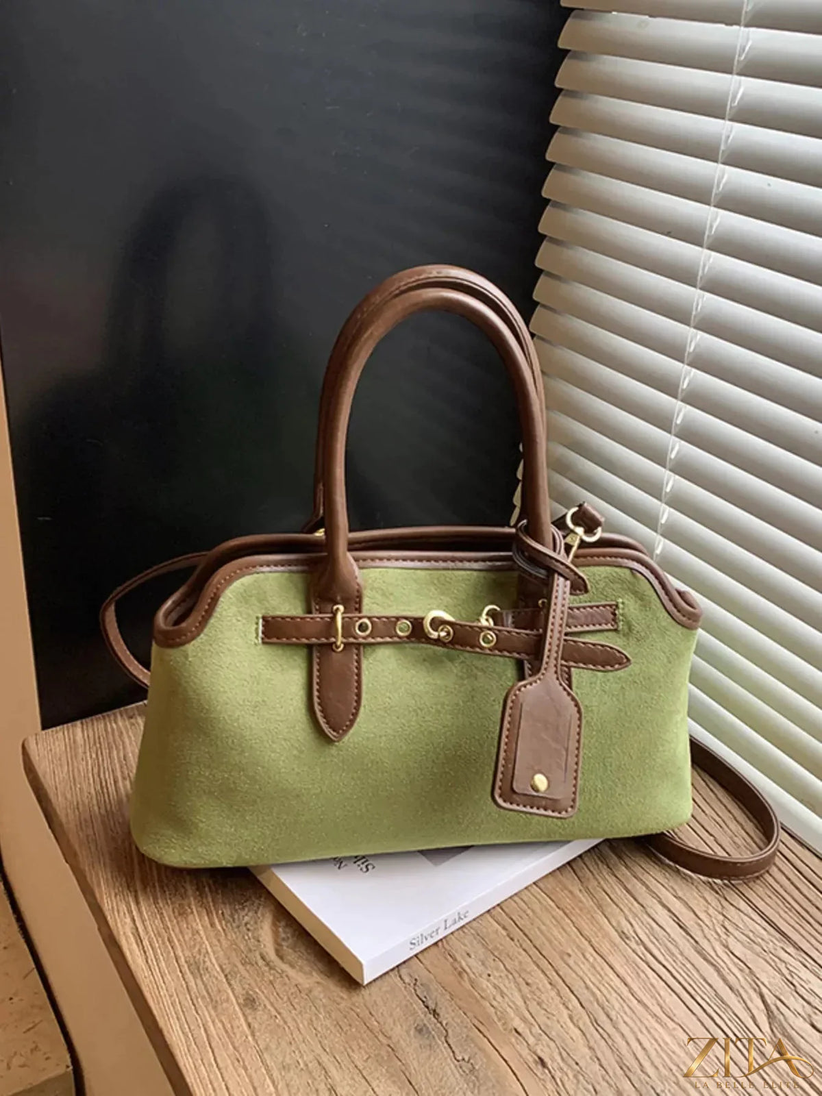 Vintage Zita La Belle Elite handbag with buckle detail, showcasing classic design and high-quality craftsmanship.