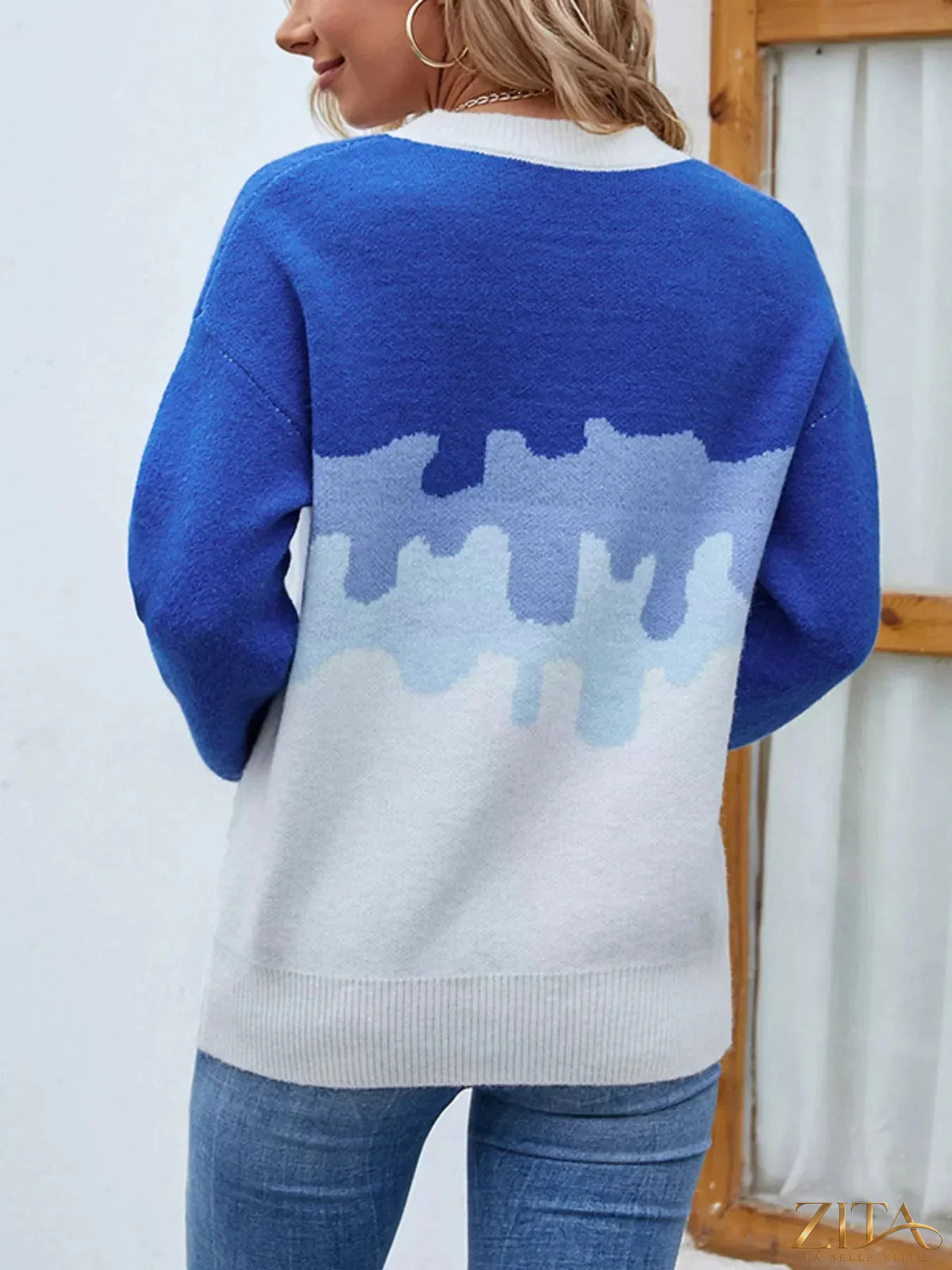 Contrast round neck sweater by Trendsi featuring a classic fit, soft fabric, and stylish color blocking design.