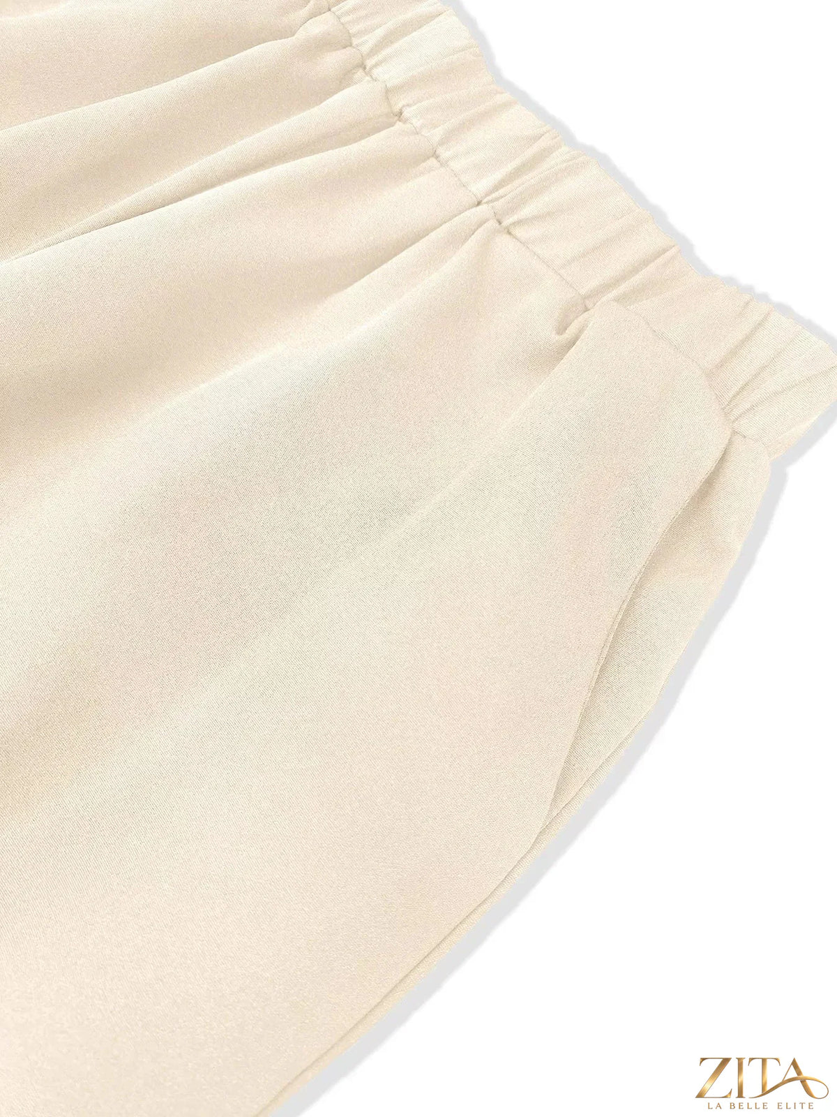 Zita La Belle Elite sleeveless top and wide-leg pants set in a stylish, coordinated outfit with a modern, elegant design.