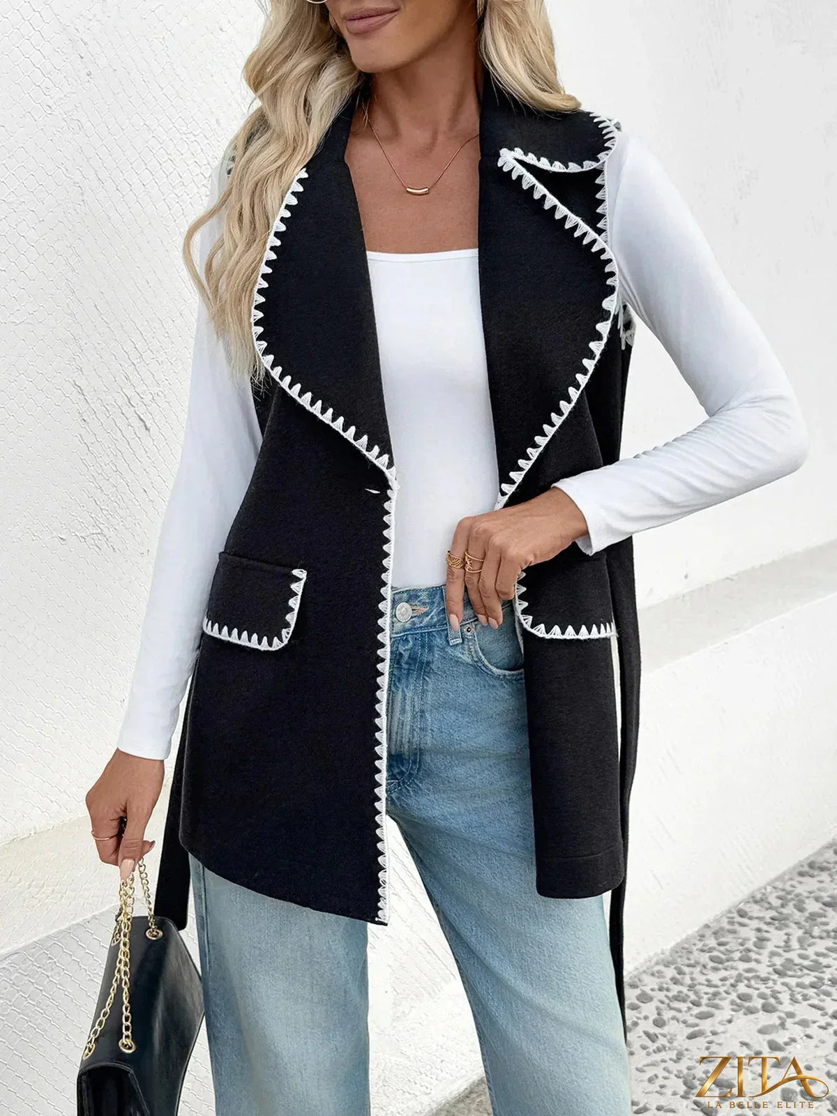 Zita La Belle Elite contrast trim collared neck vest coat in neutral fabric with black and white detailing.