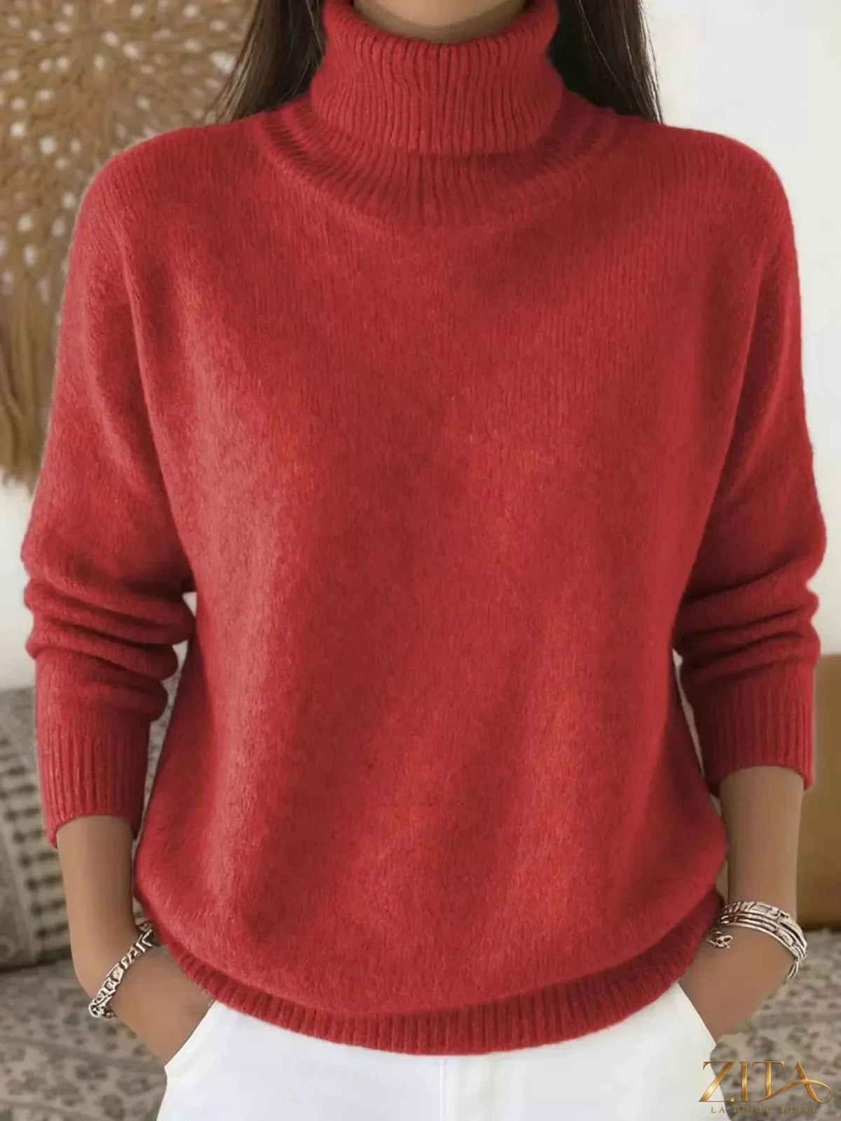 Light beige turtleneck long sleeve sweater from Trendsi with a fitted design, featuring soft knit fabric and ribbed cuffs.