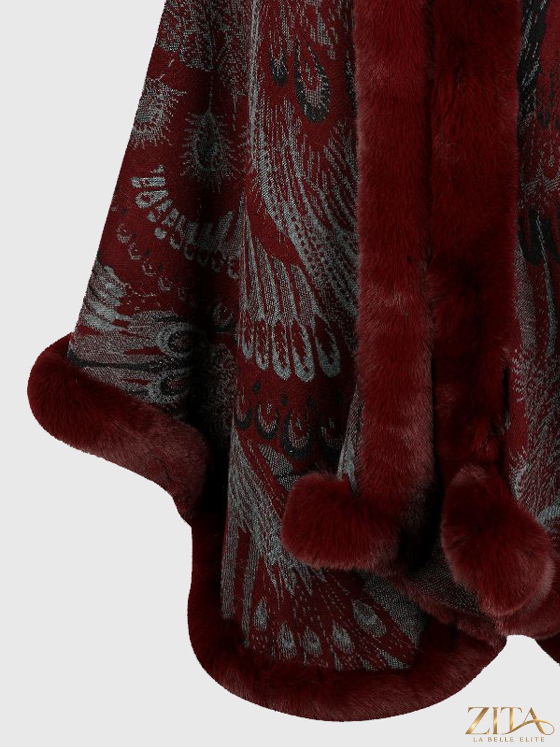 Printed open front poncho from Trendsi, featuring a colorful geometric pattern and relaxed fit, perfect for layering.