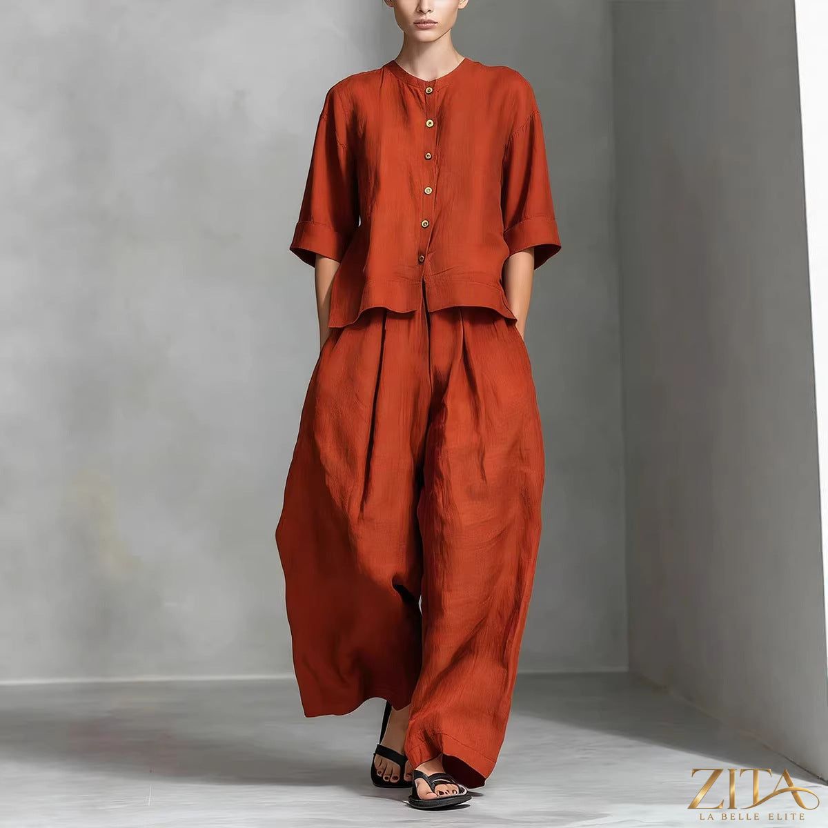 Zita La Belle Elite three-quarter sleeve shirt and loose trousers two-piece set, shown in a casual, stylish outfit.